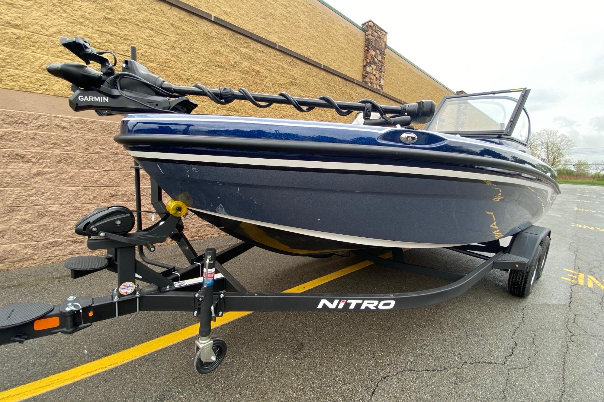 2026 Nitro ZV19 Pro boat on trailer with Garmin equipment, parked outdoors.