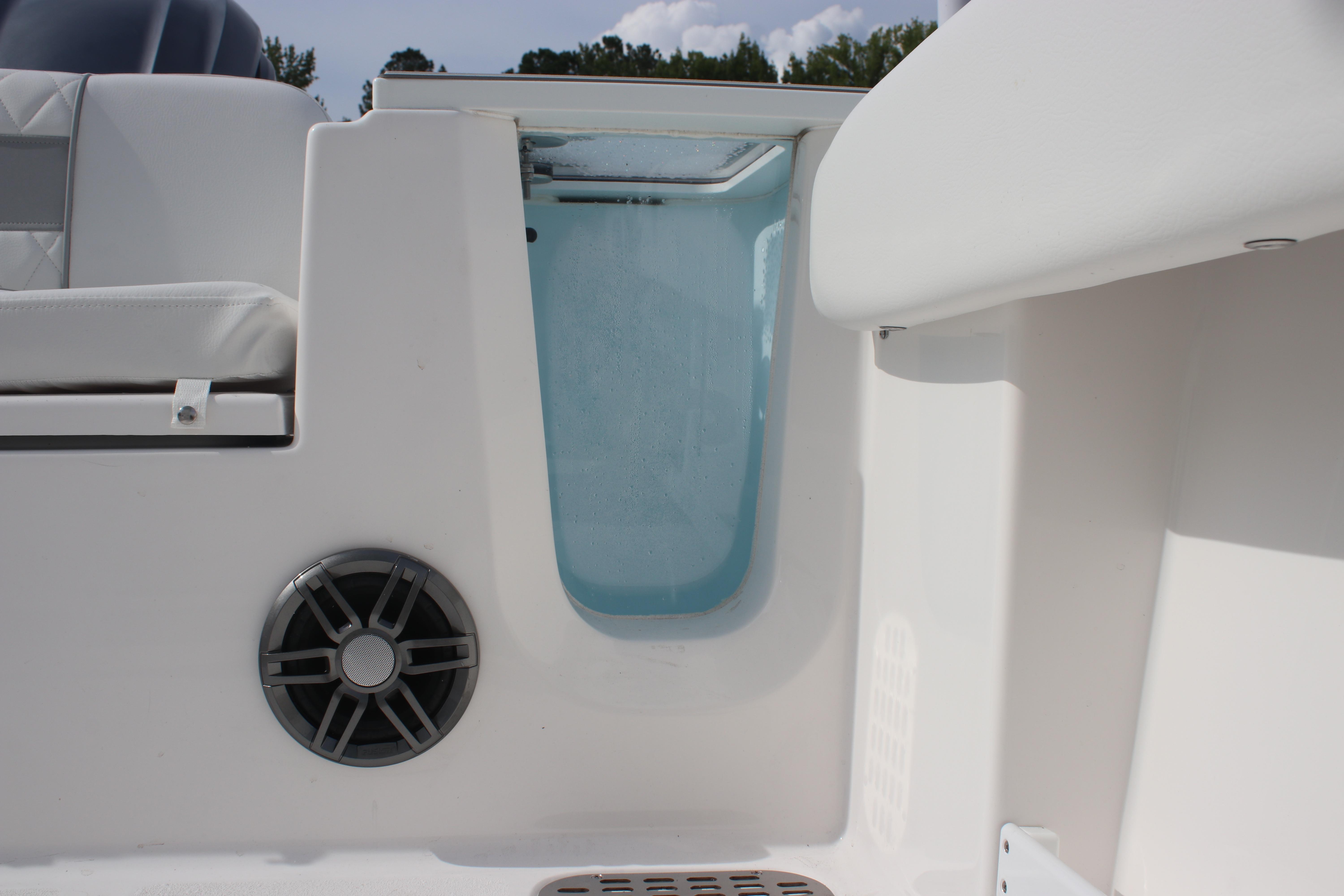 2026 Sea Fox 248 Commander boat interior with speaker and storage compartment.