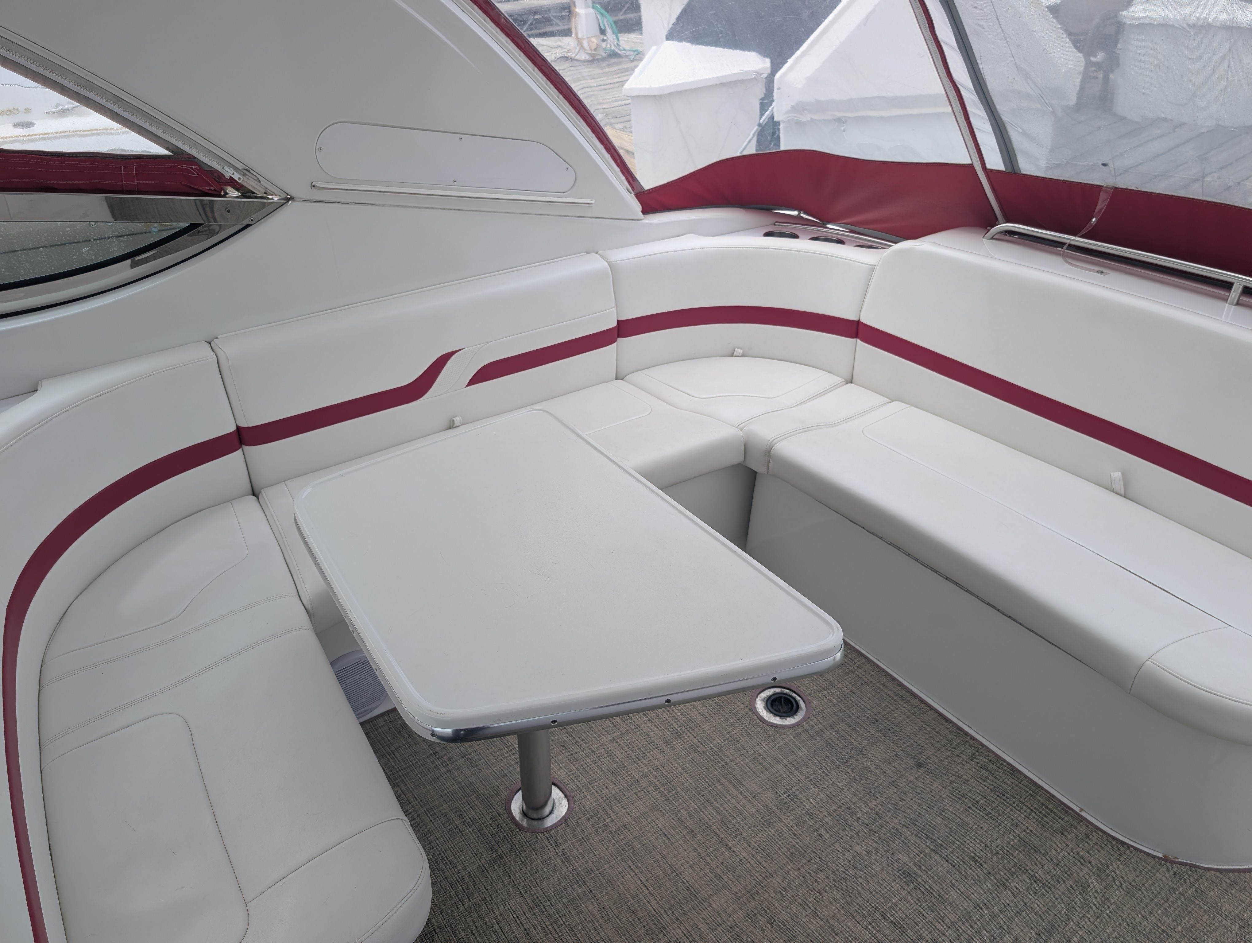 Interior of a 2007 Formula 400 Super Sport with white and red upholstery.