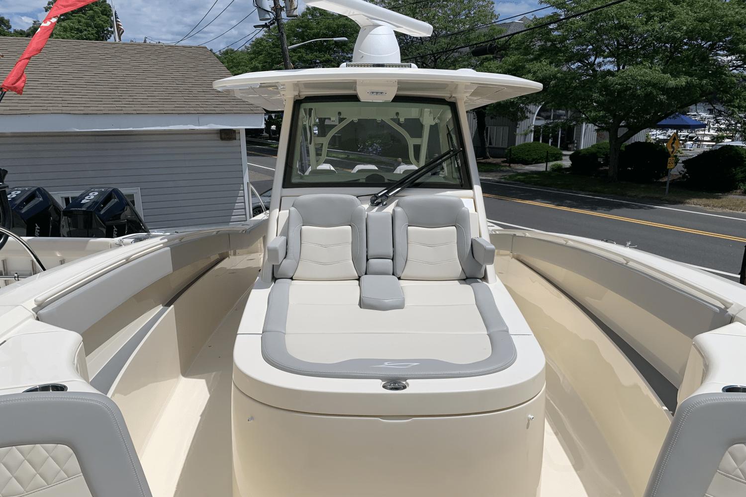 2024 Scout 357LXF boat interior with cushioned seating and modern design.