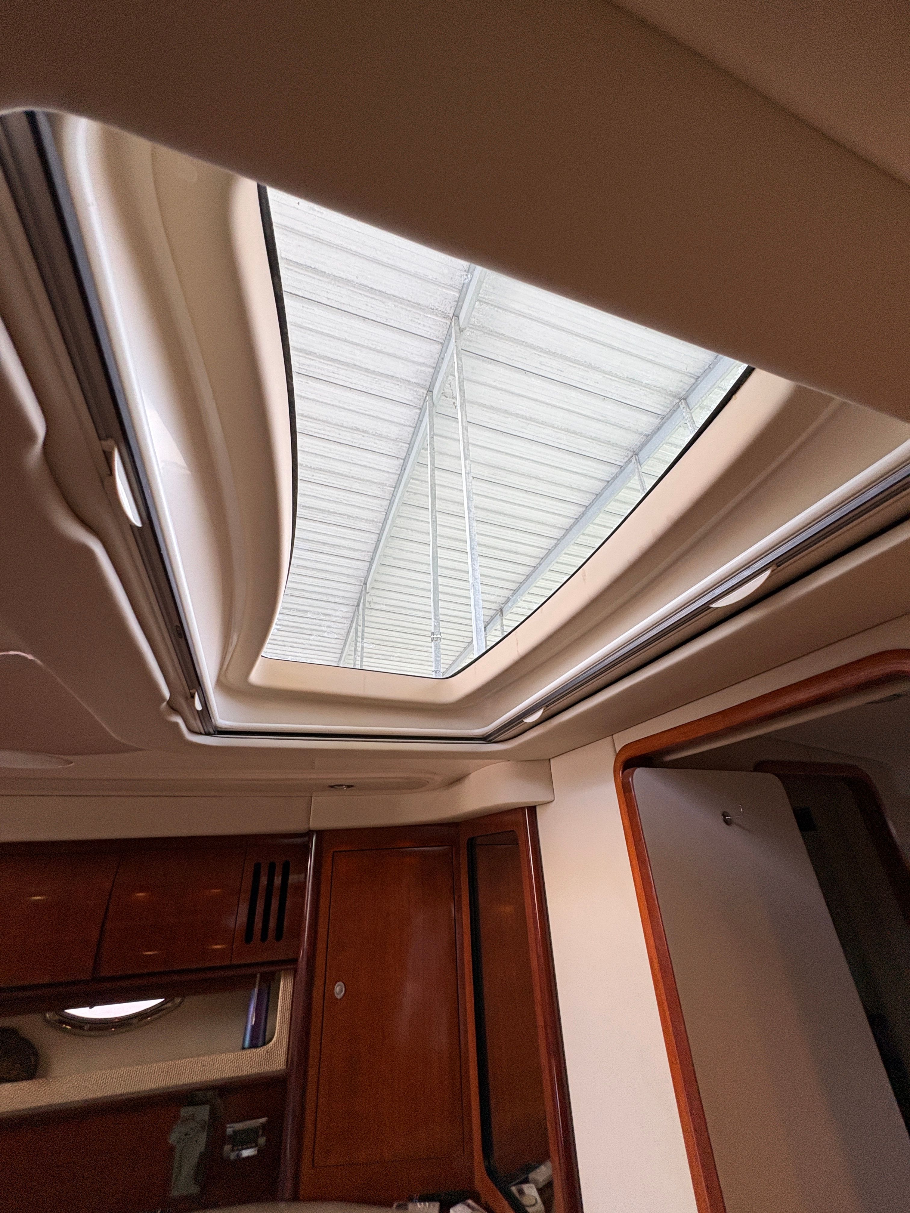 Interior view of 2005 Sea Ray 420 Sundancer with skylight.