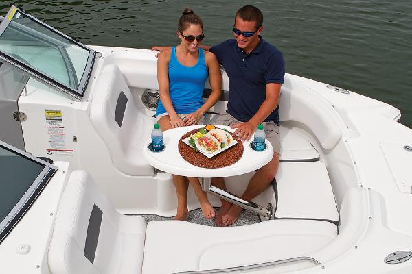 Manufacturer Provided Image: Couple enjoying a meal on a 2016 Chaparral 244 Sunesta boat.