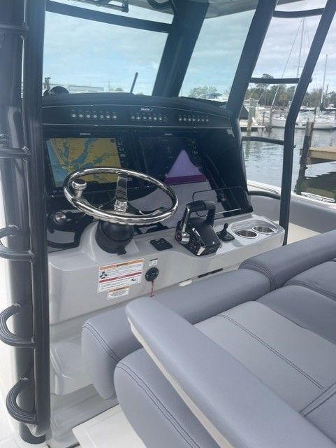 Interior view of 2023 Boston Whaler 330 Outrage cockpit.