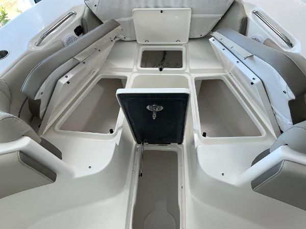 2024 Key West 263 FS boat interior with open storage compartments.