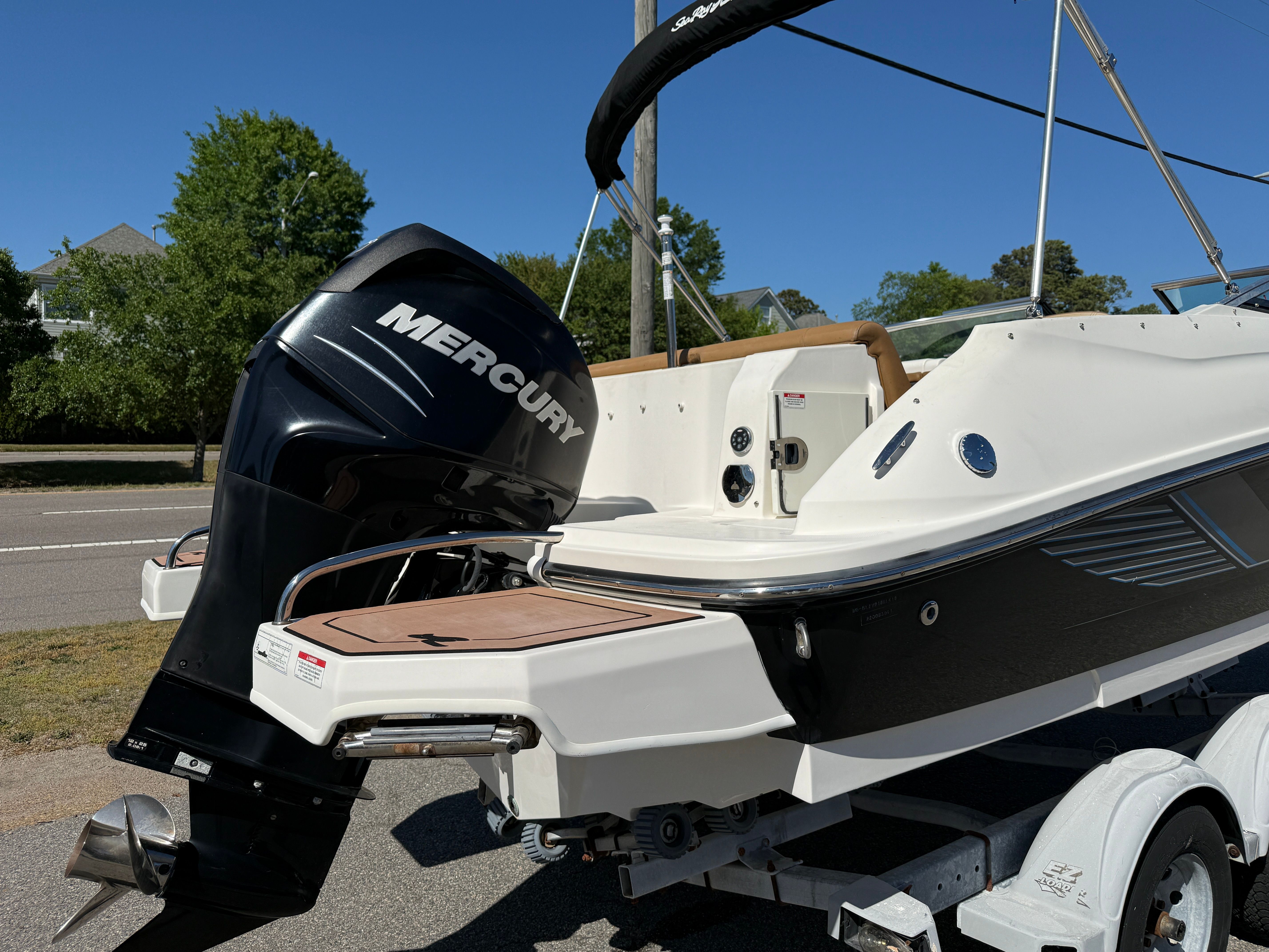 2015 Sea Ray 220 Sundeck OB with Mercury outboard motor.