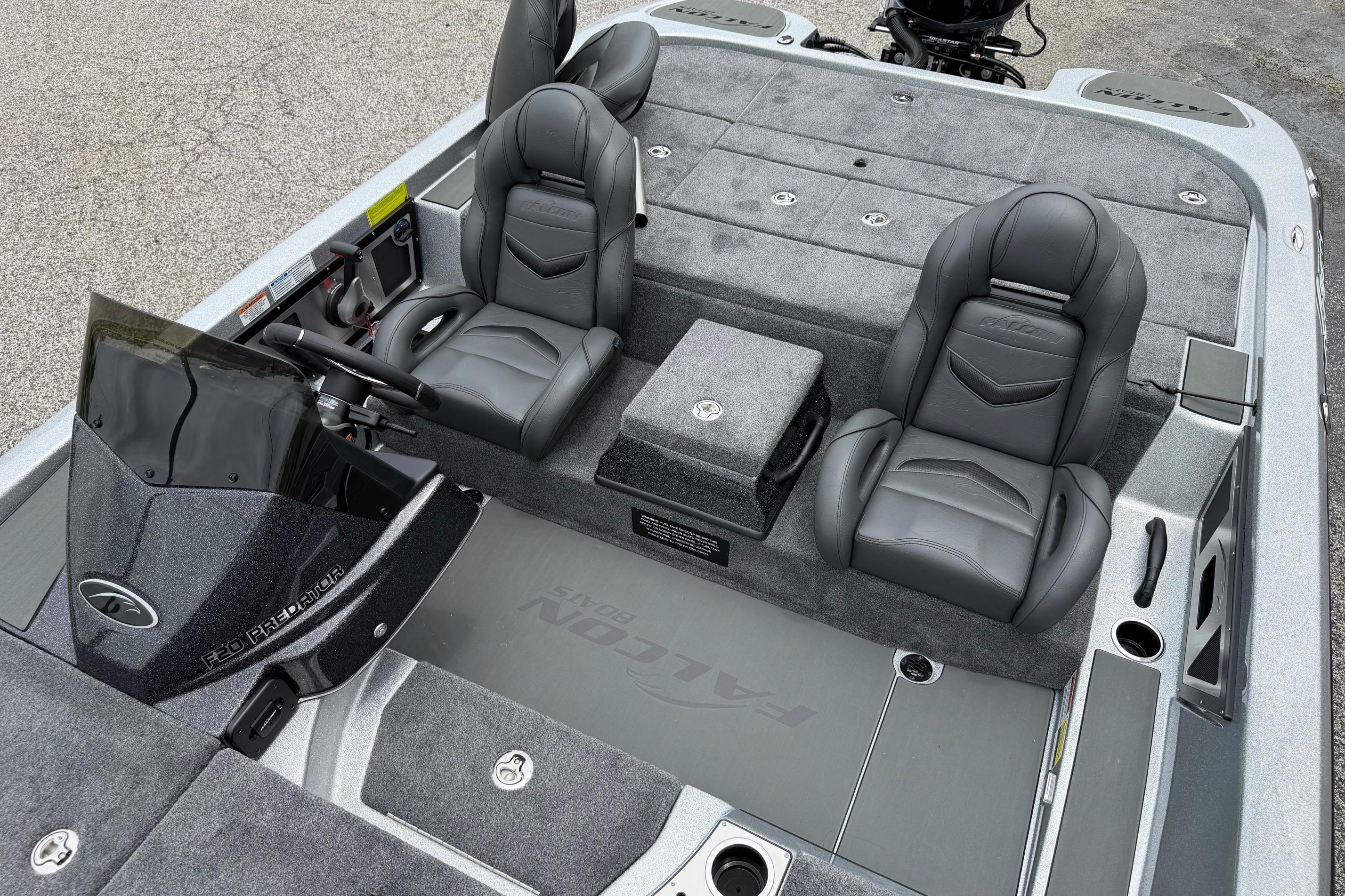 2027 Falcon F20 PREDATOR boat interior with sleek black seats and modern dashboard design.