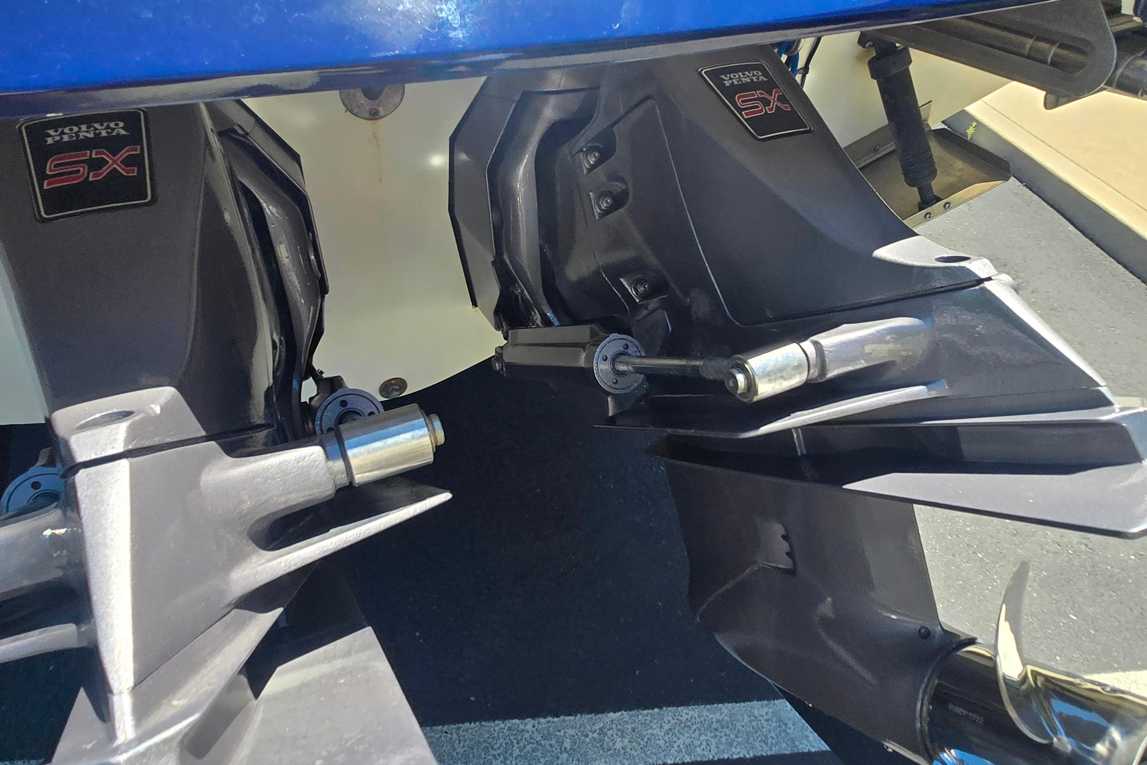 Close-up of Volvo Penta SX outdrives on a 2002 Chris-Craft Launch 28 GT I/O boat.