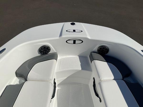 2025 Tahoe T18 boat interior with white seating and built-in speakers.