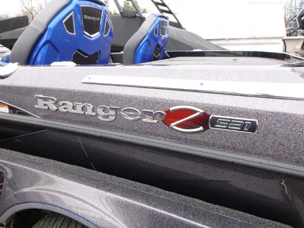 2025 Ranger Z521 boat with blue seats and metallic finish.