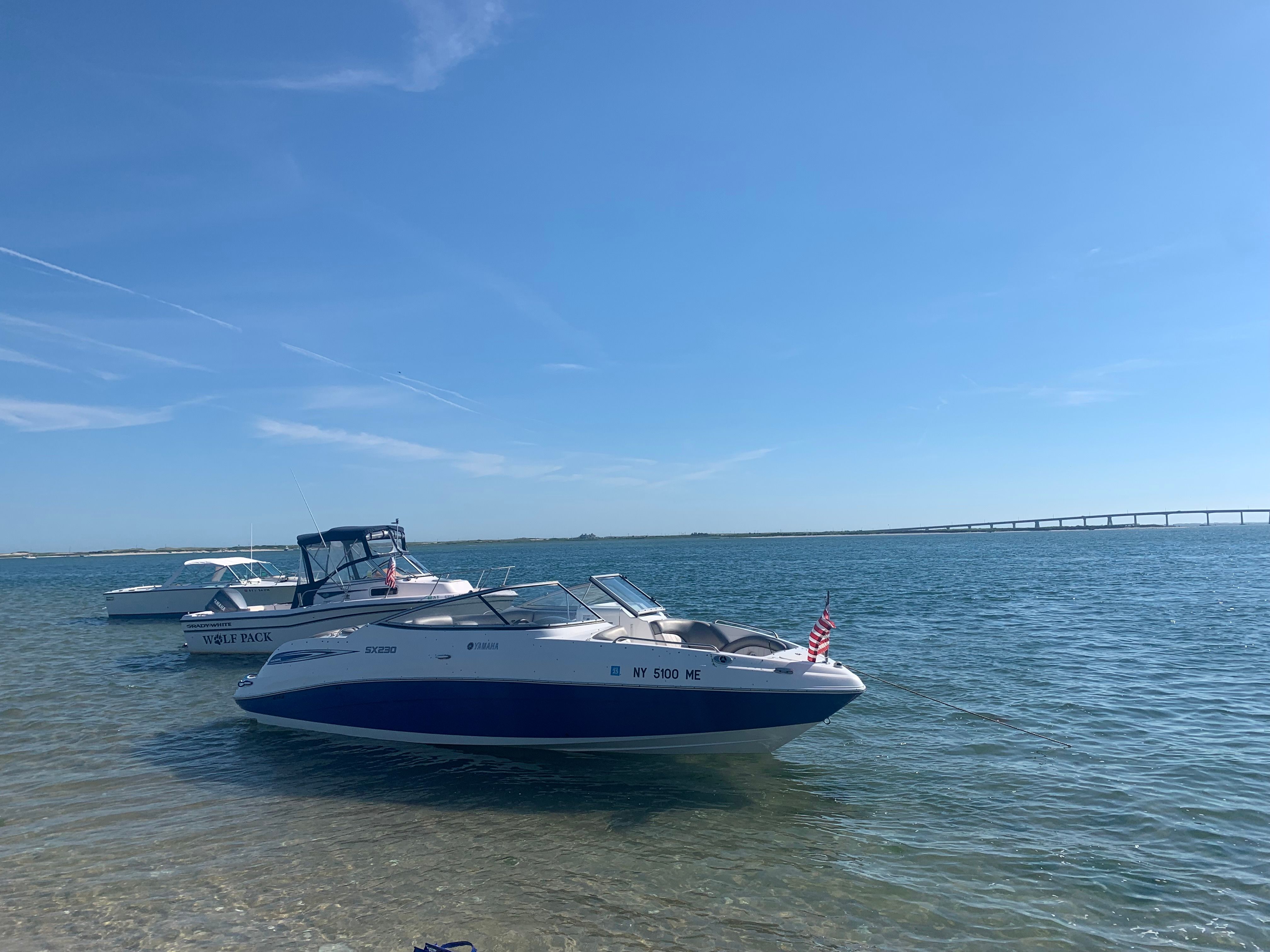 2008 Yamaha SX230 HO boat on calm water.