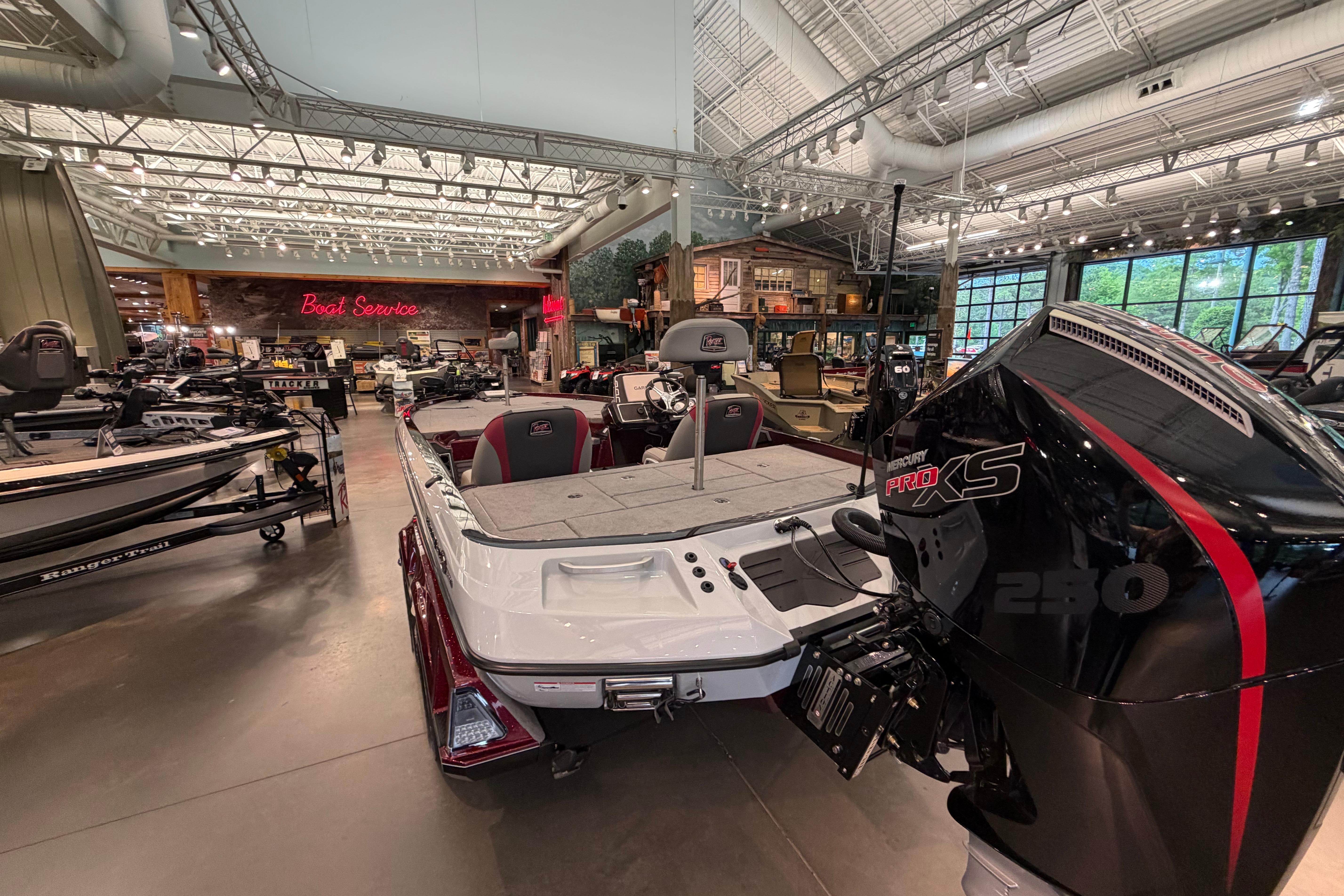 2026 Ranger Z521 boat displayed in a showroom with Mercury Pro XS engine.