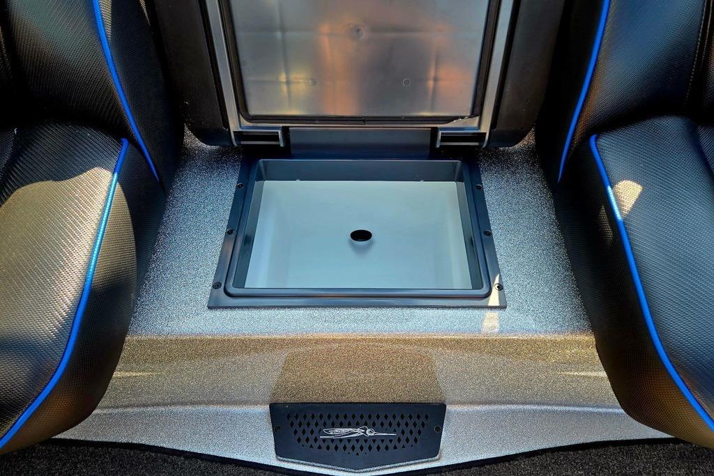 2026 Skeeter ZXE20 boat interior with open storage compartment between seats.