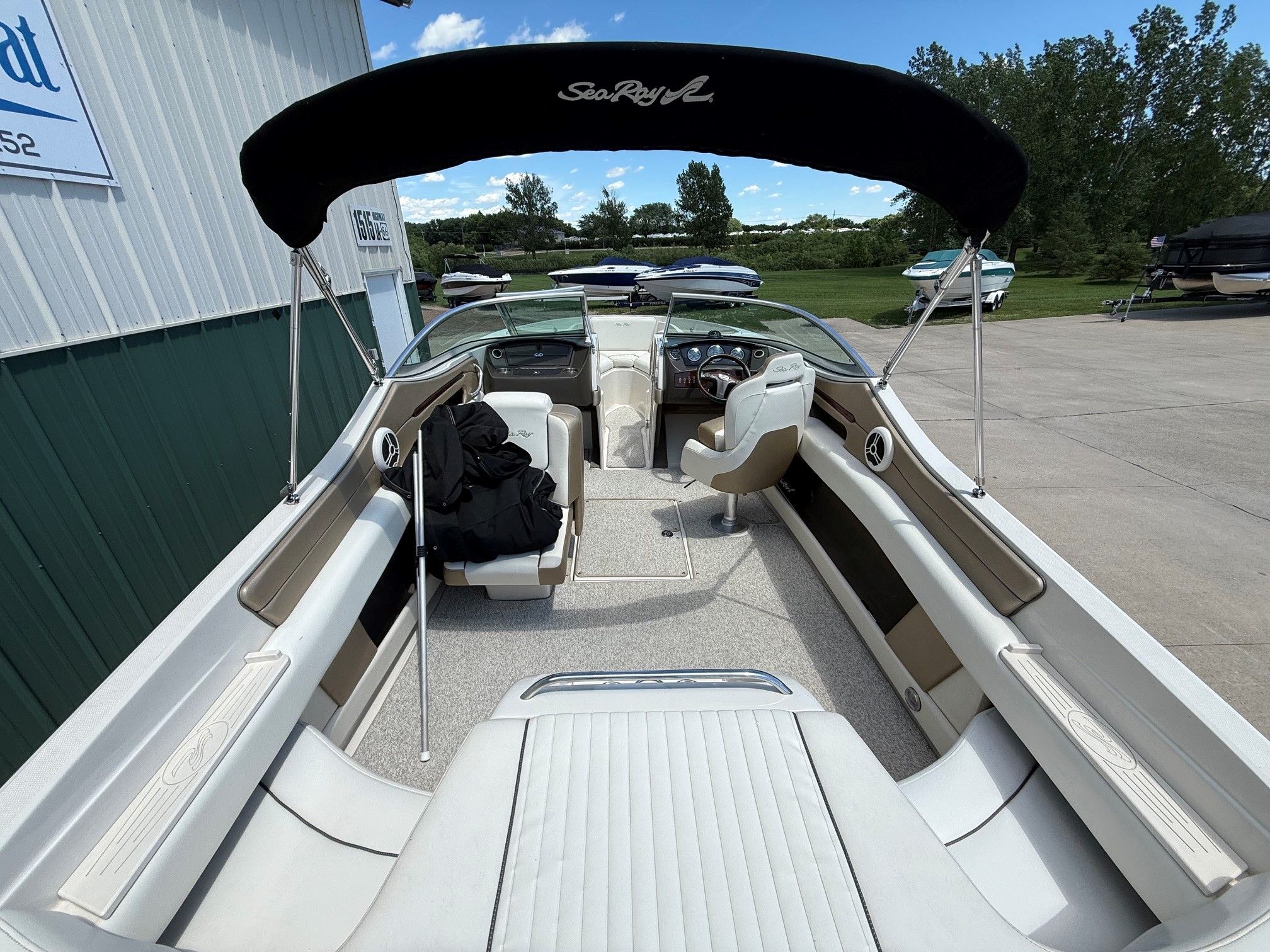 Interior view of a 2007 Sea Ray 230 Select boat outdoors.