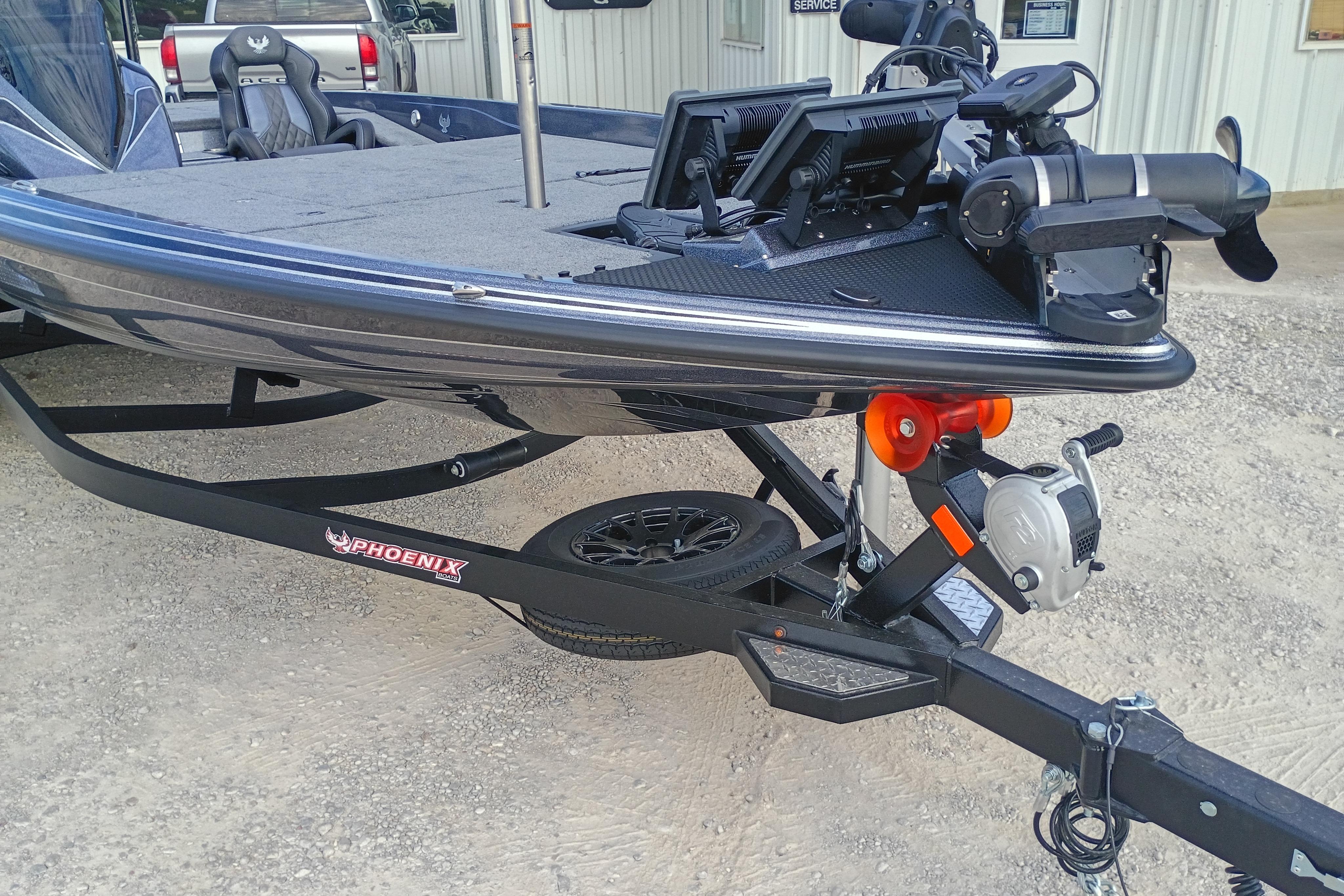 2026 Phoenix 921 ELITEX boat on trailer, featuring advanced equipment and sleek design.