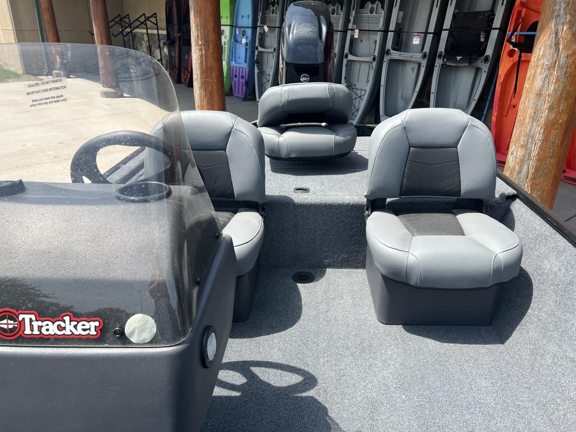 2025 Tracker Bass Tracker Classic XL boat interior with gray seating and steering console.