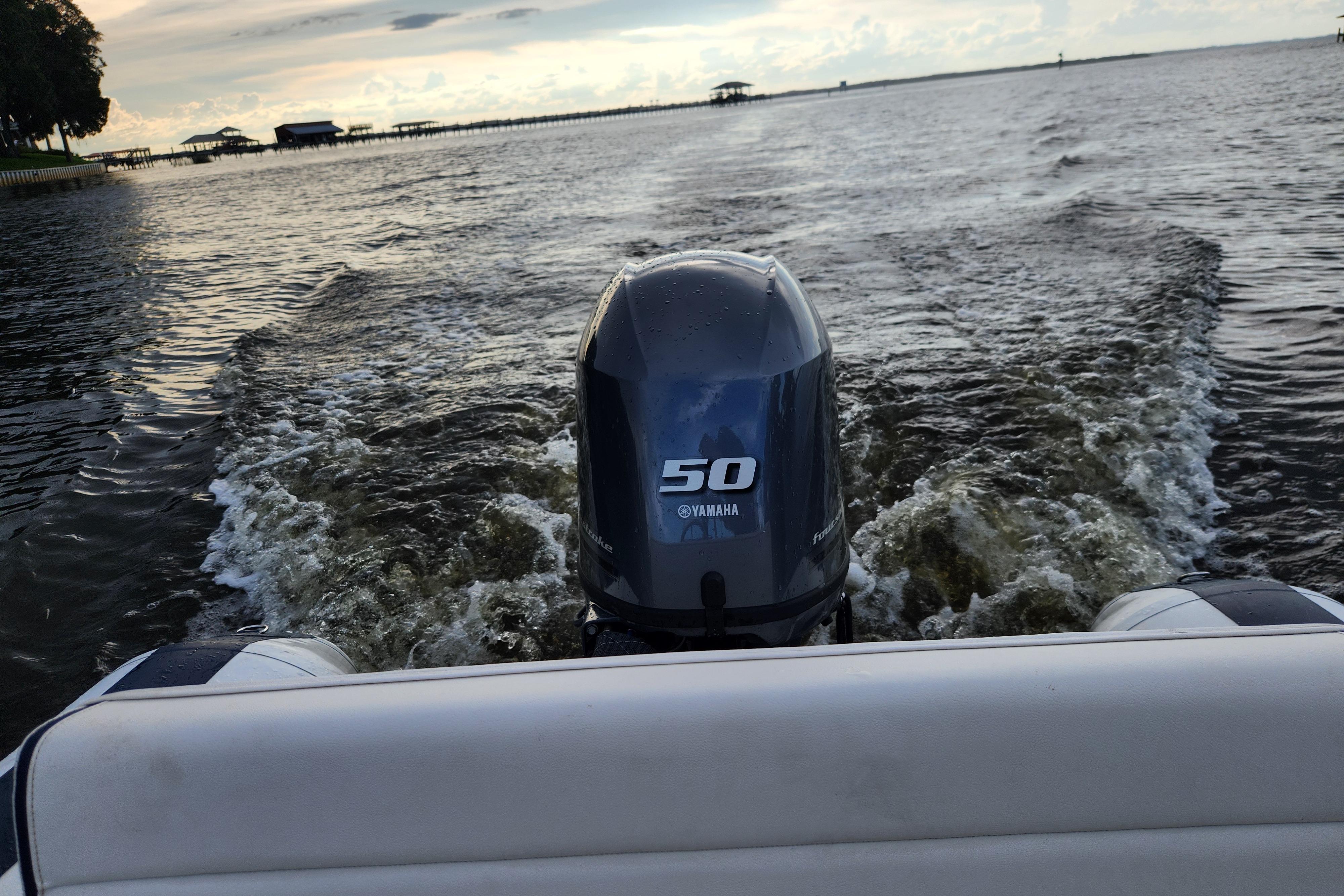 Novurania DL 400 boat with Yamaha 50 engine cruising on a scenic waterway, 2019 model.