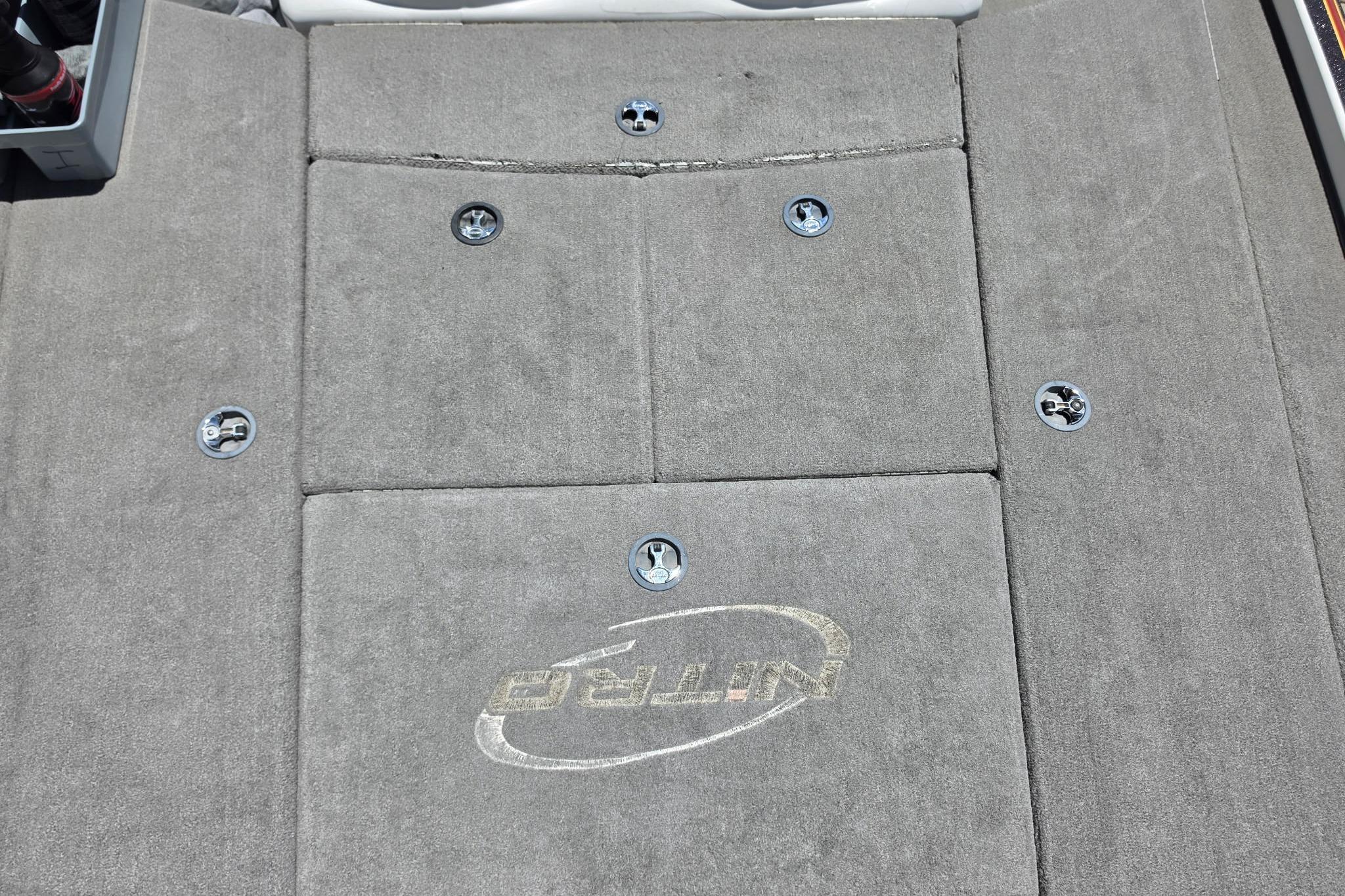 2008 Nitro Z-9 boat deck with carpet and storage compartments.