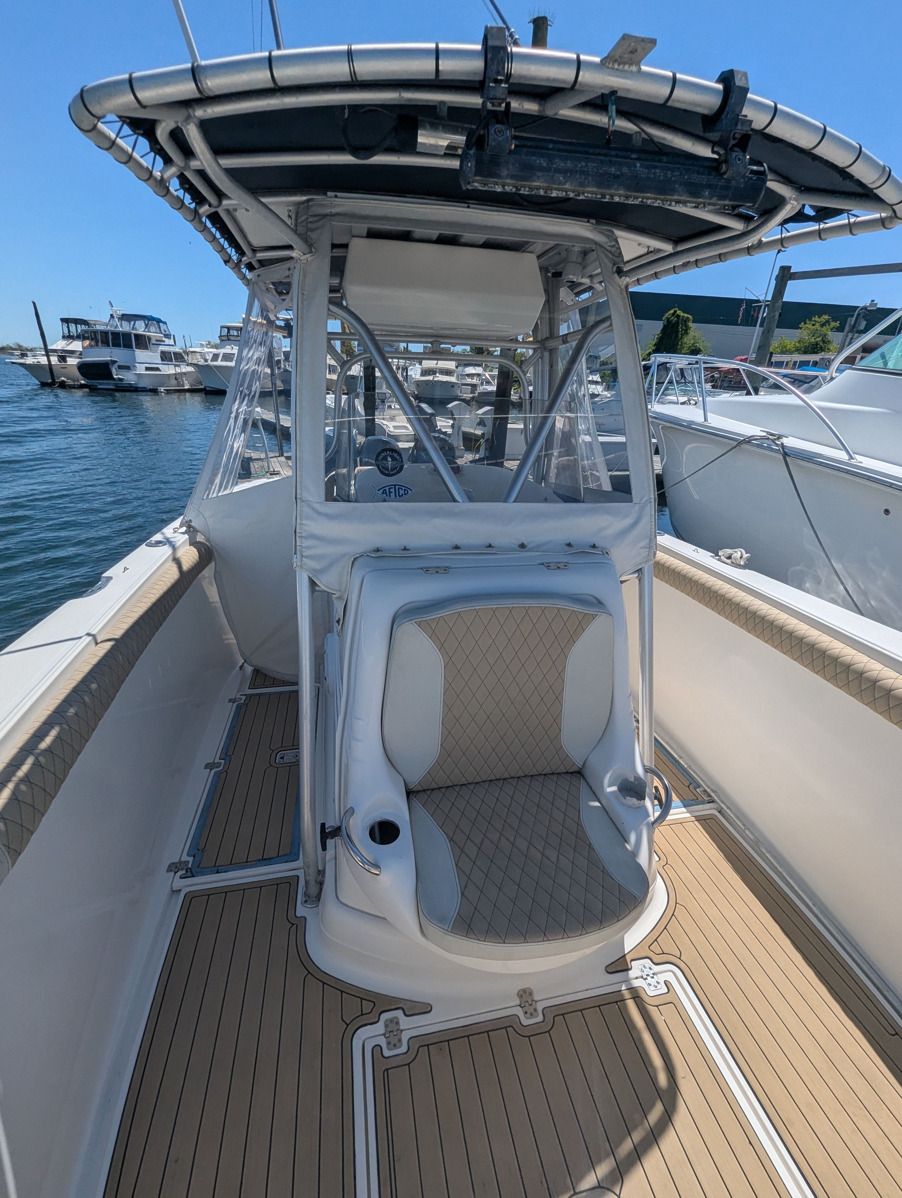 2005 Wellcraft 35 CCF boat with modern cockpit design.