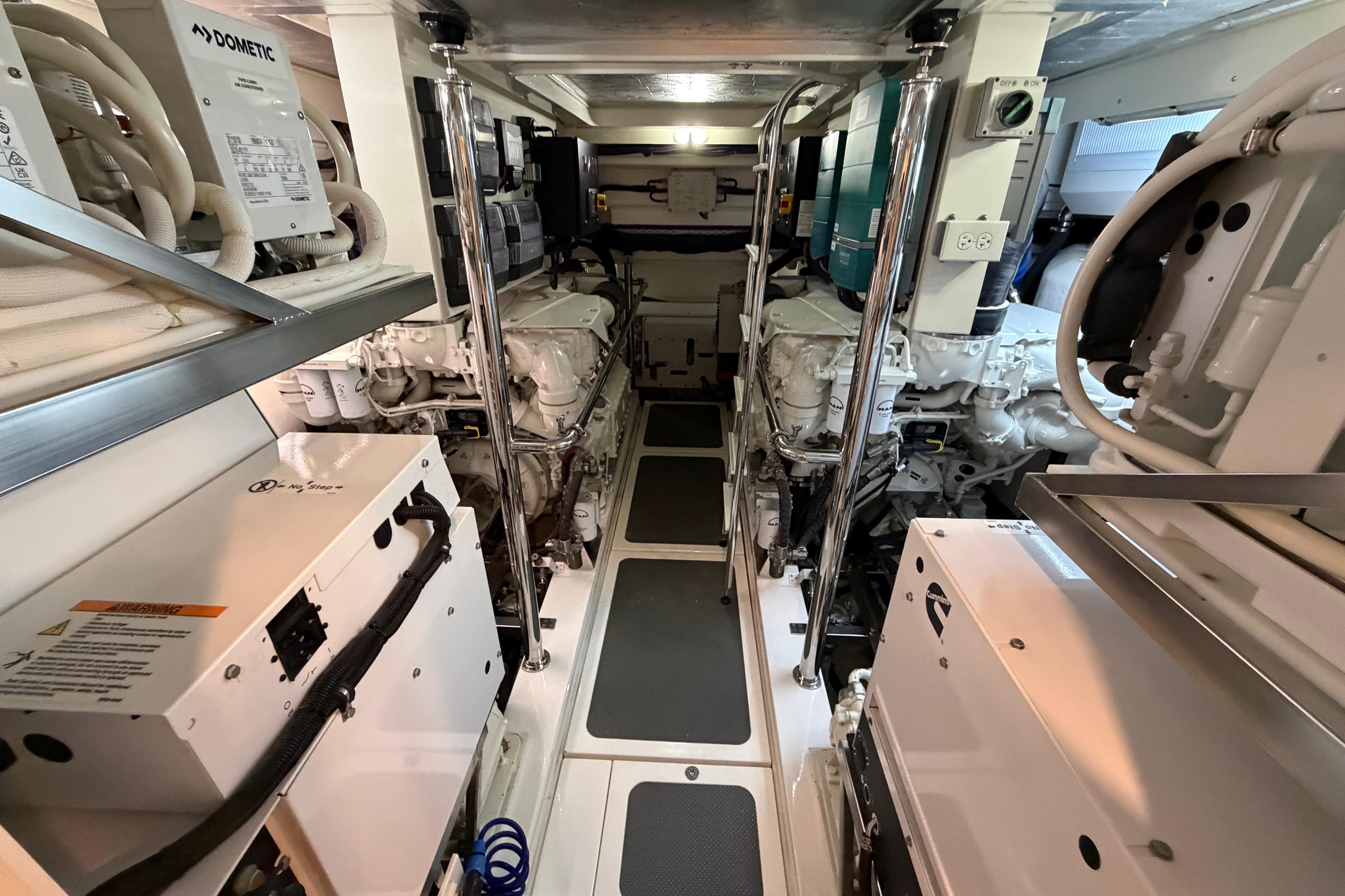 Engine room of 2023 Riviera 645 SUV yacht, showcasing advanced machinery and equipment.