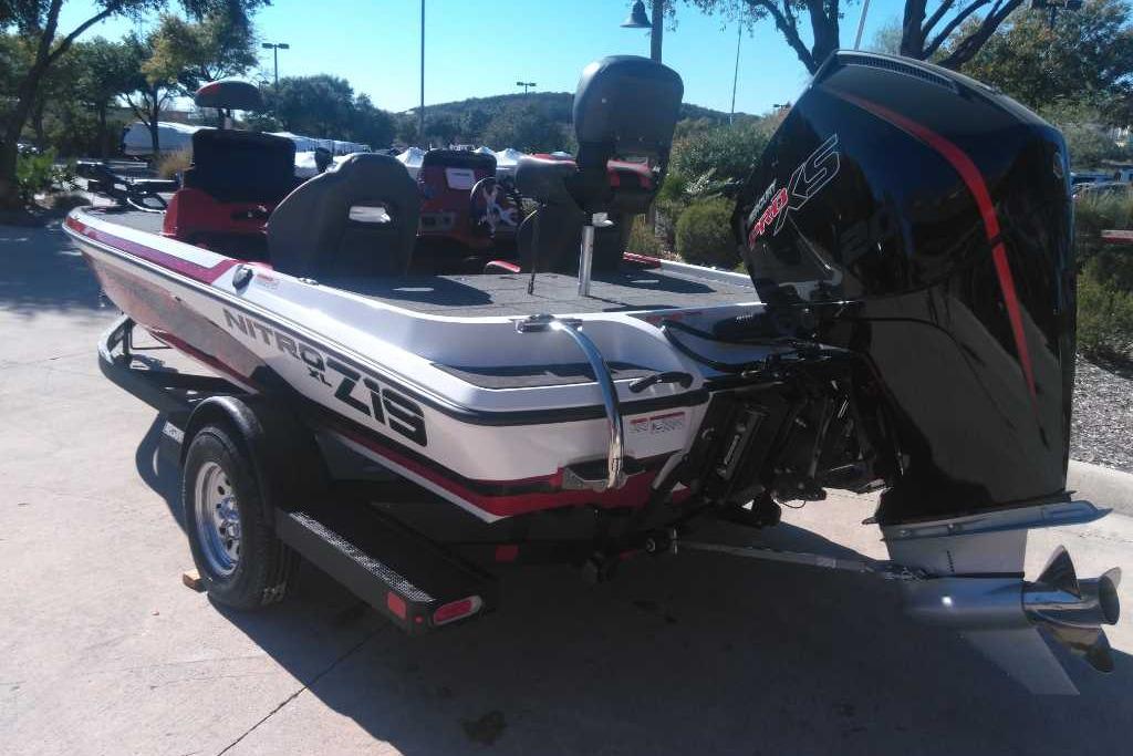 2026 Nitro Z19 XL boat with powerful engine, parked outdoors on a sunny day.