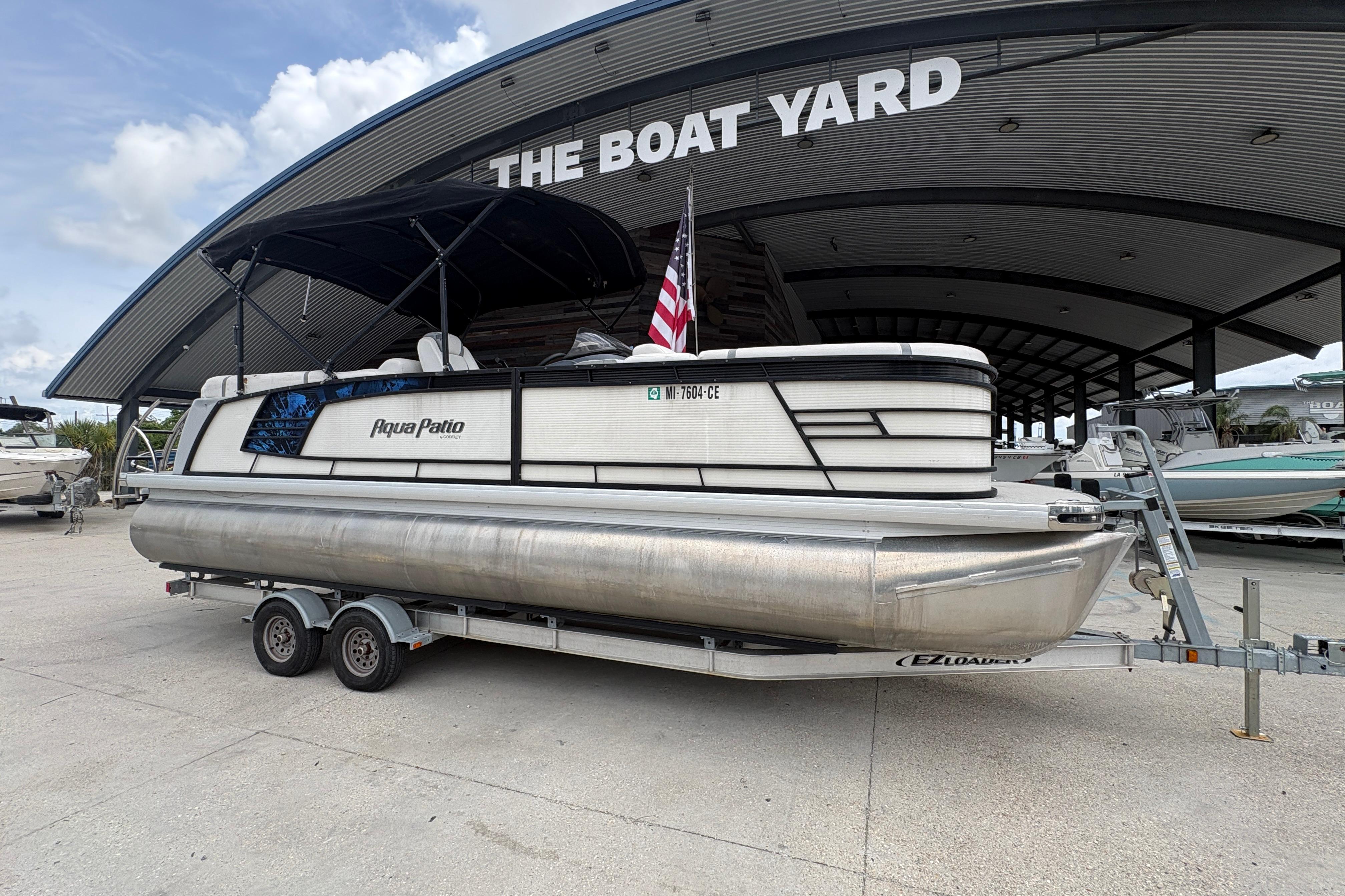 2019 Godfrey Aqua Patio pontoon boat on trailer at The Boat Yard.