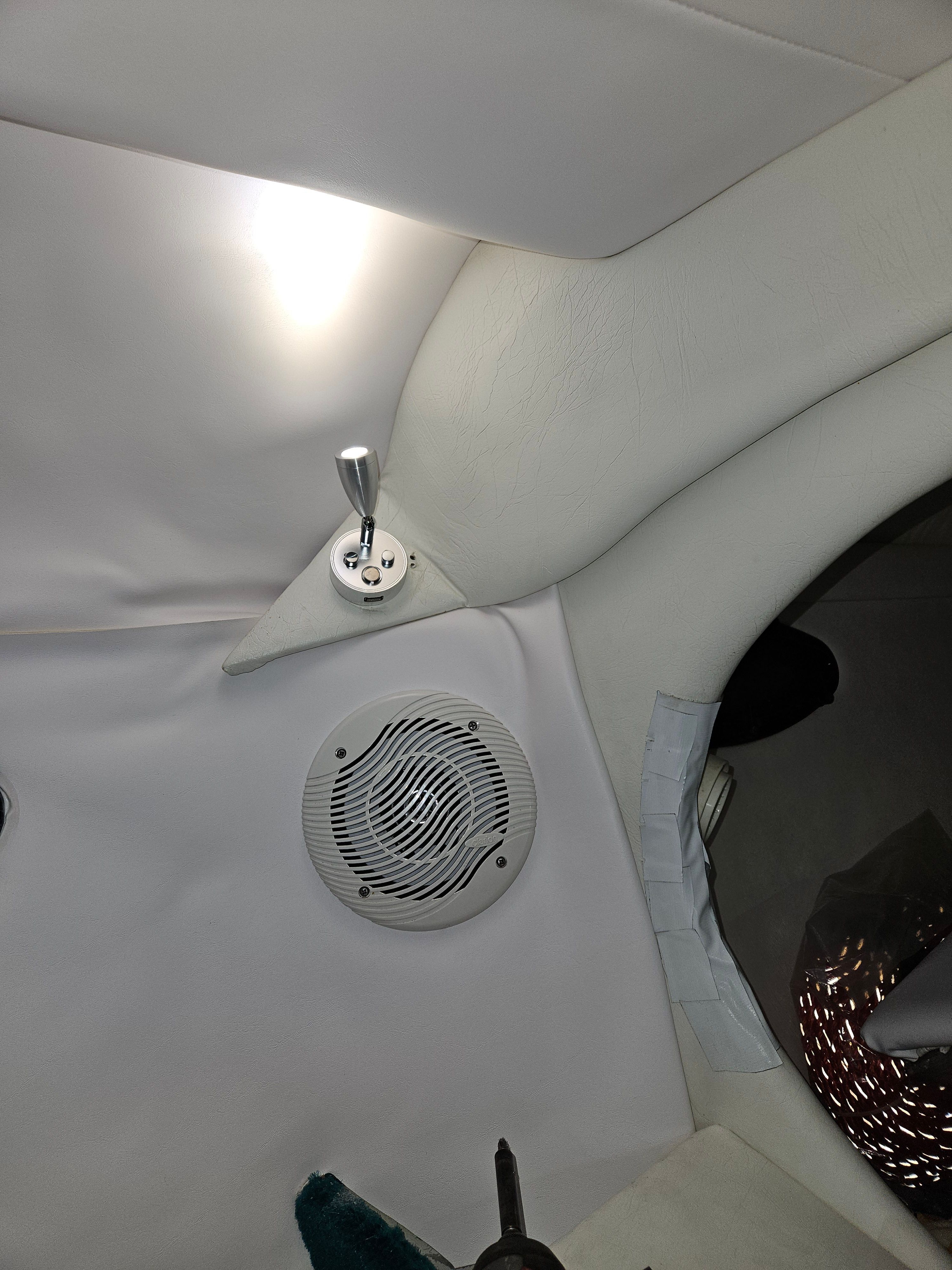Interior view of a 1996 Baja 302 Boss featuring a speaker and lighting.