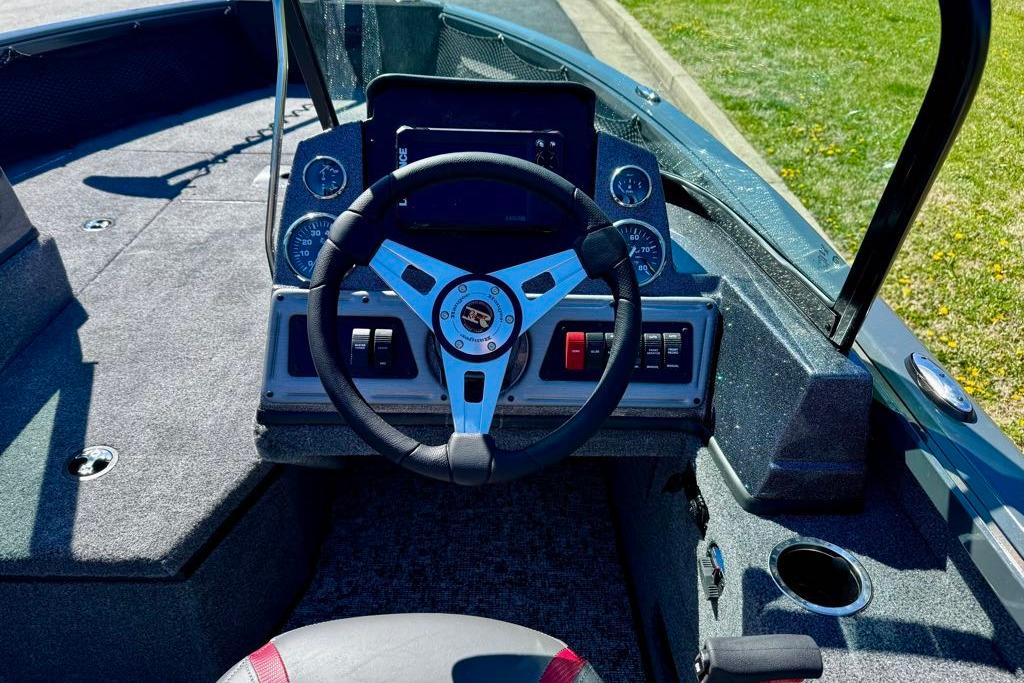 2026 Ranger VS1882SC Reata boat dashboard with steering wheel and control panel.