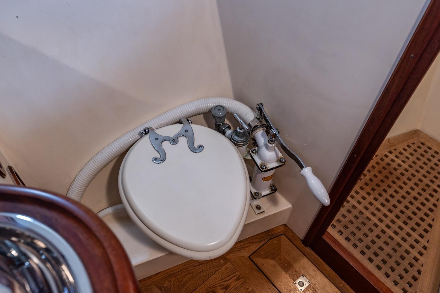 1932 De Vries Lentsch Bromo yacht marine toilet with manual pump handle.