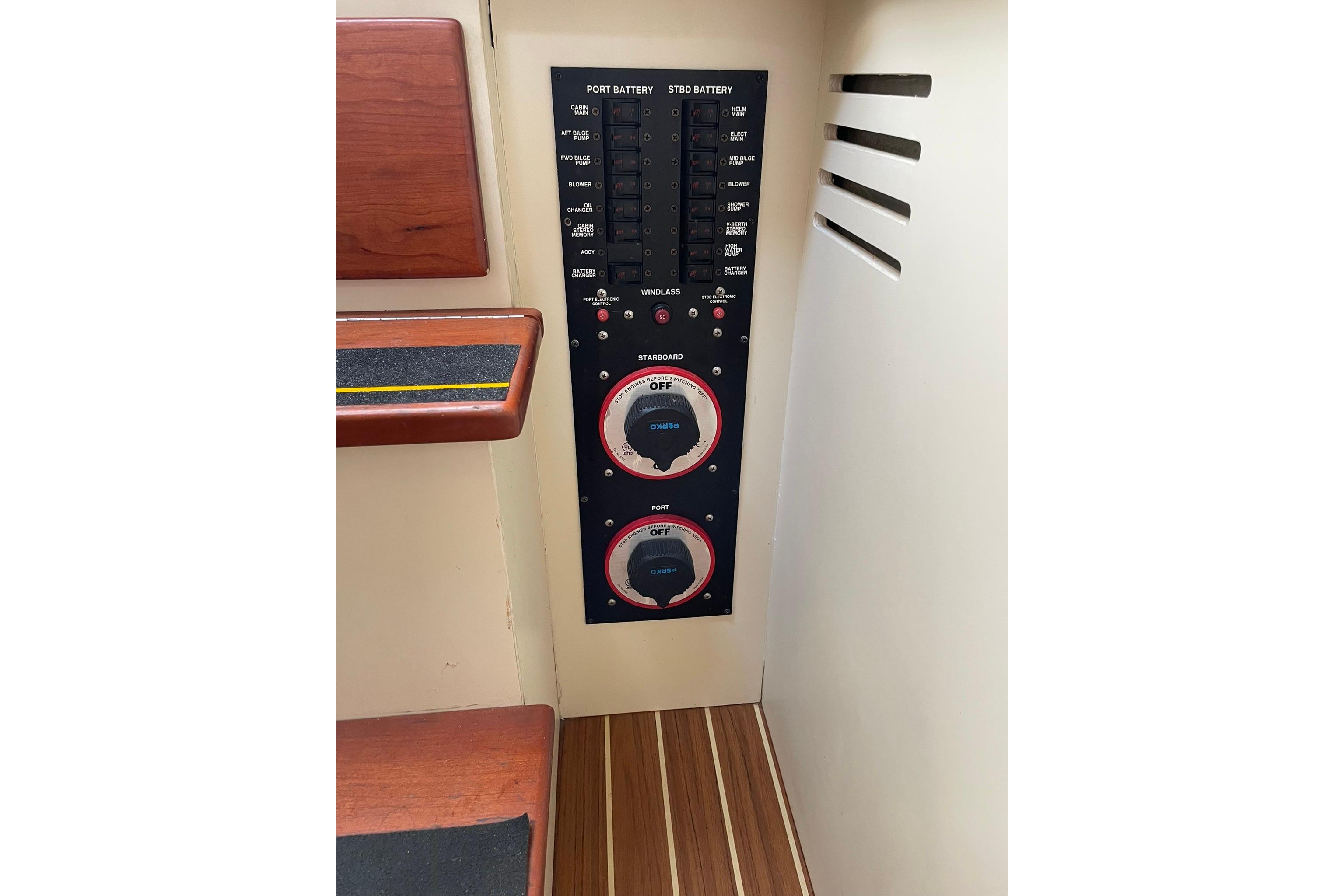 Control panel of a 2008 Luhrs 28 Open boat, featuring battery switches and circuit breakers.