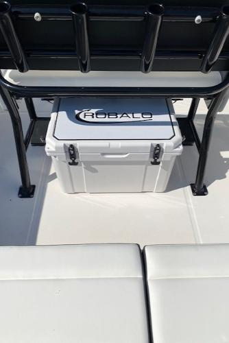 2024 Robalo R222 Center Console boat with cooler and seating.
