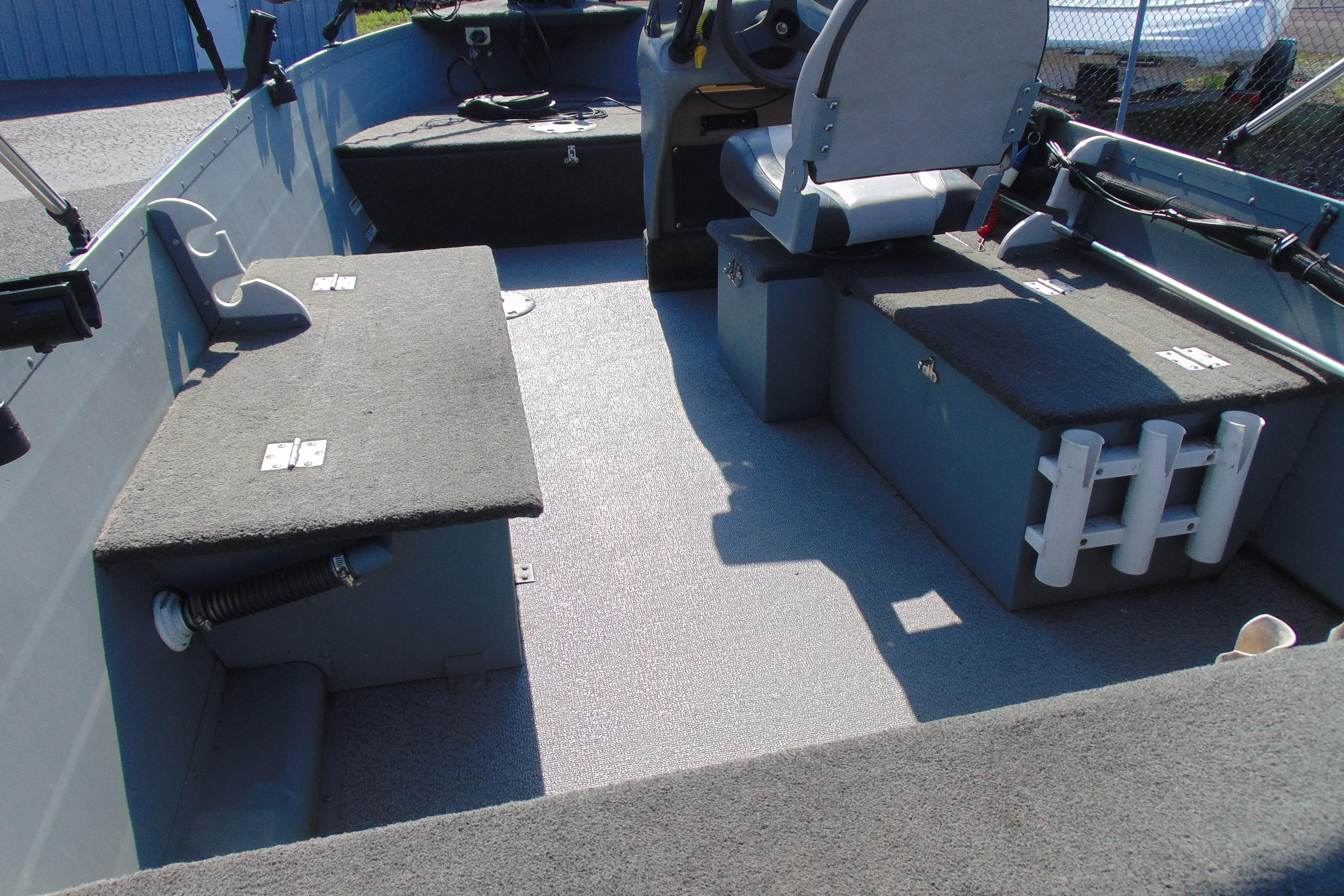 2017 Starcraft SF 16 DLX boat interior with seating and storage compartments.