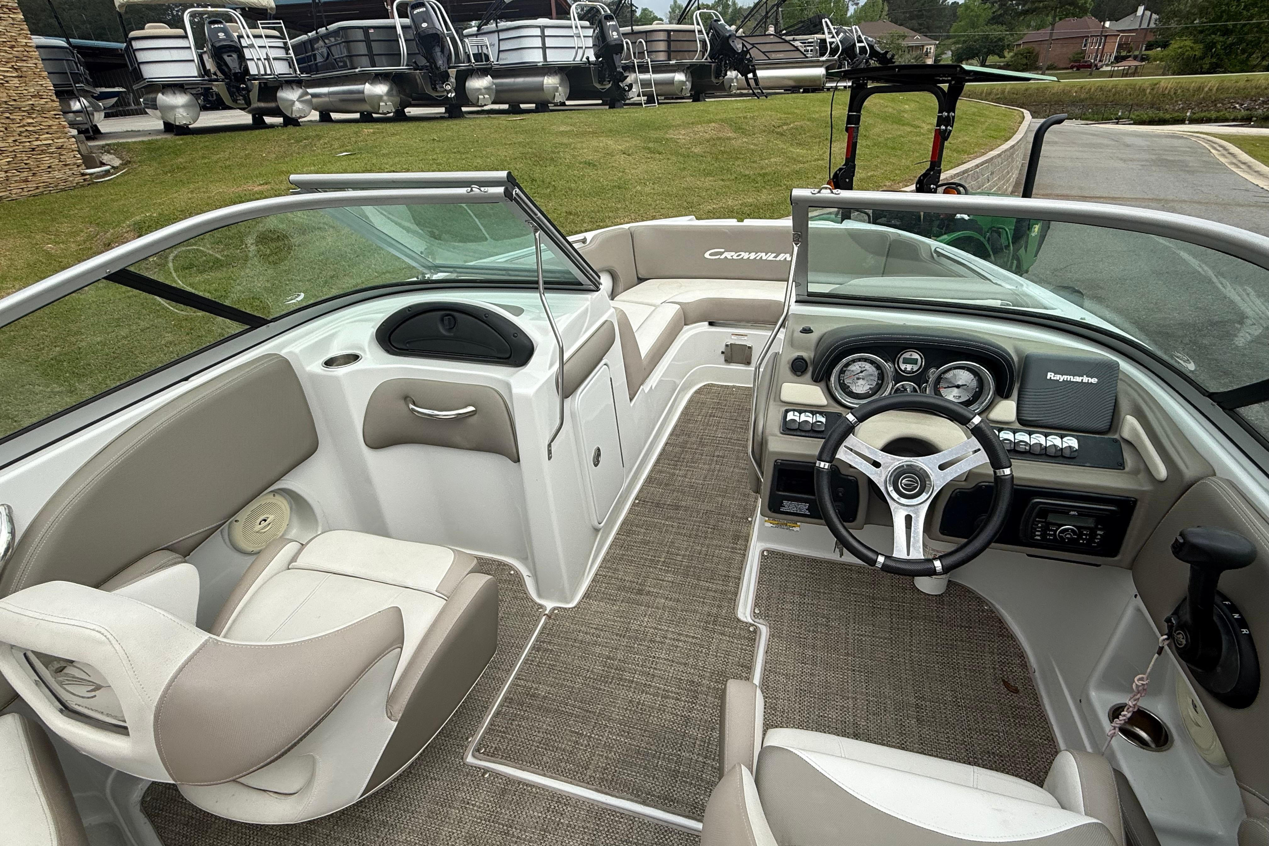 2017 Crownline Eclipse E1 XS boat interior with steering wheel and seating.