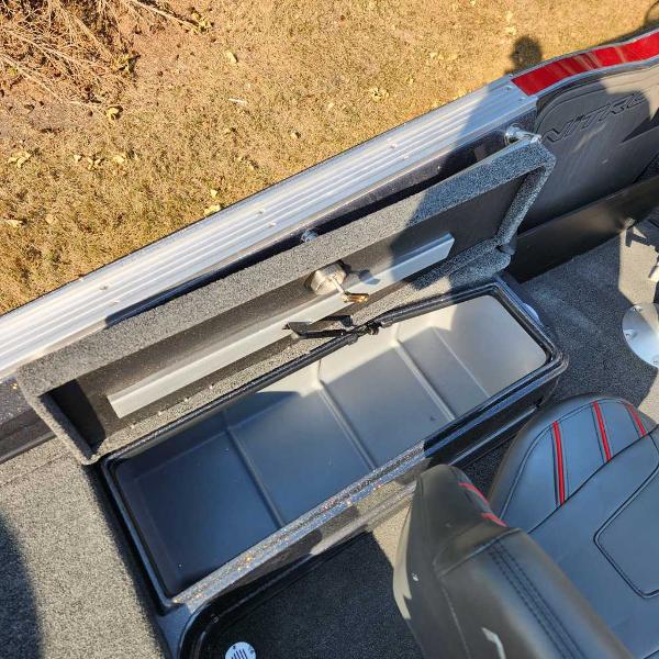 2024 Nitro ZV20 Pro boat storage compartment with open lid, showcasing interior space.