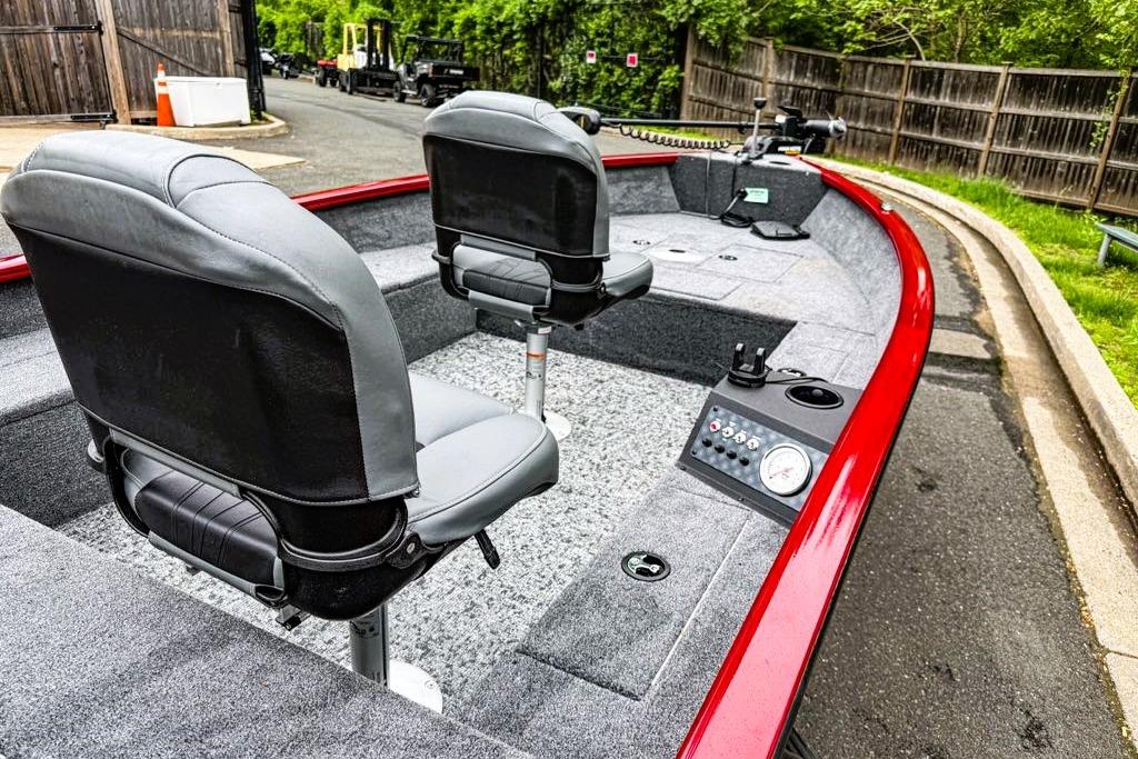 2025 Tracker Super Guide V-16 T boat interior with dual seats and control panel.