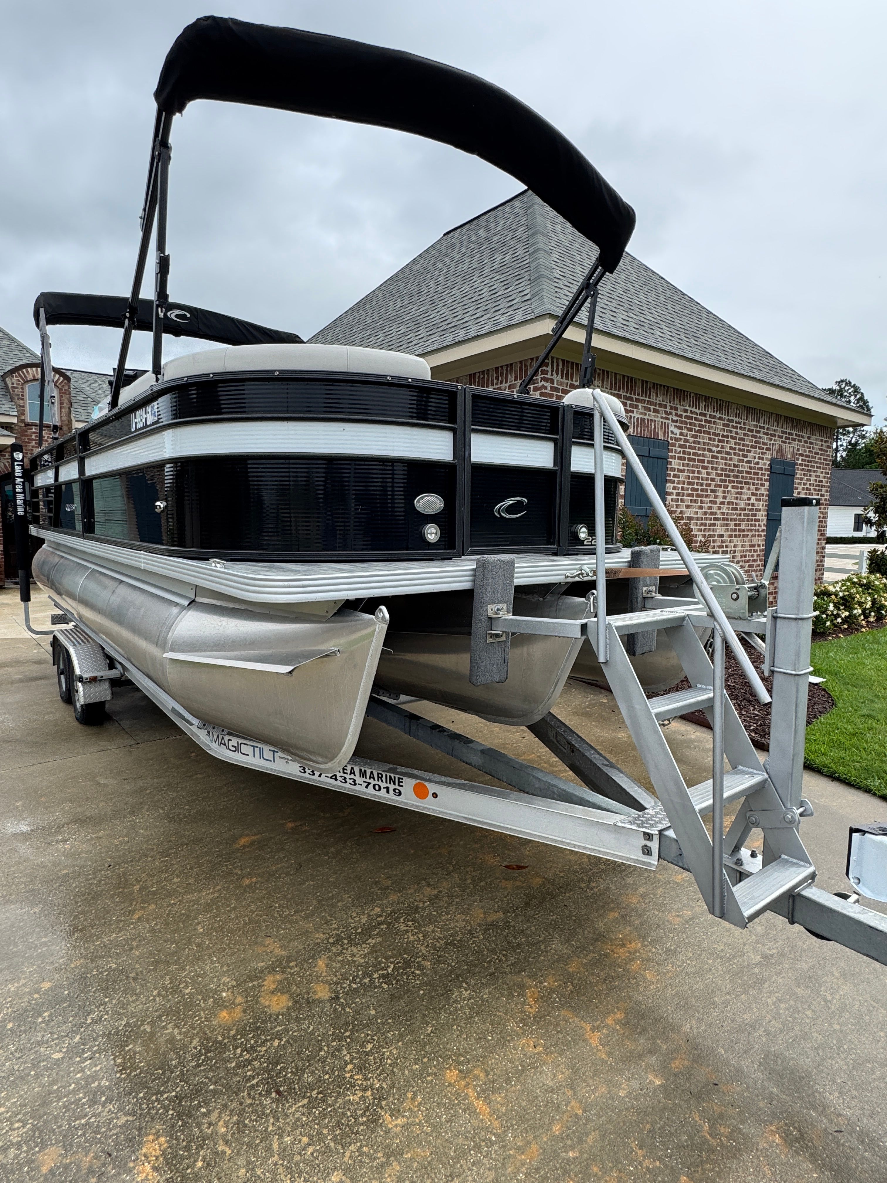 2022 Crest Classic DLX 220 pontoon boat on trailer.