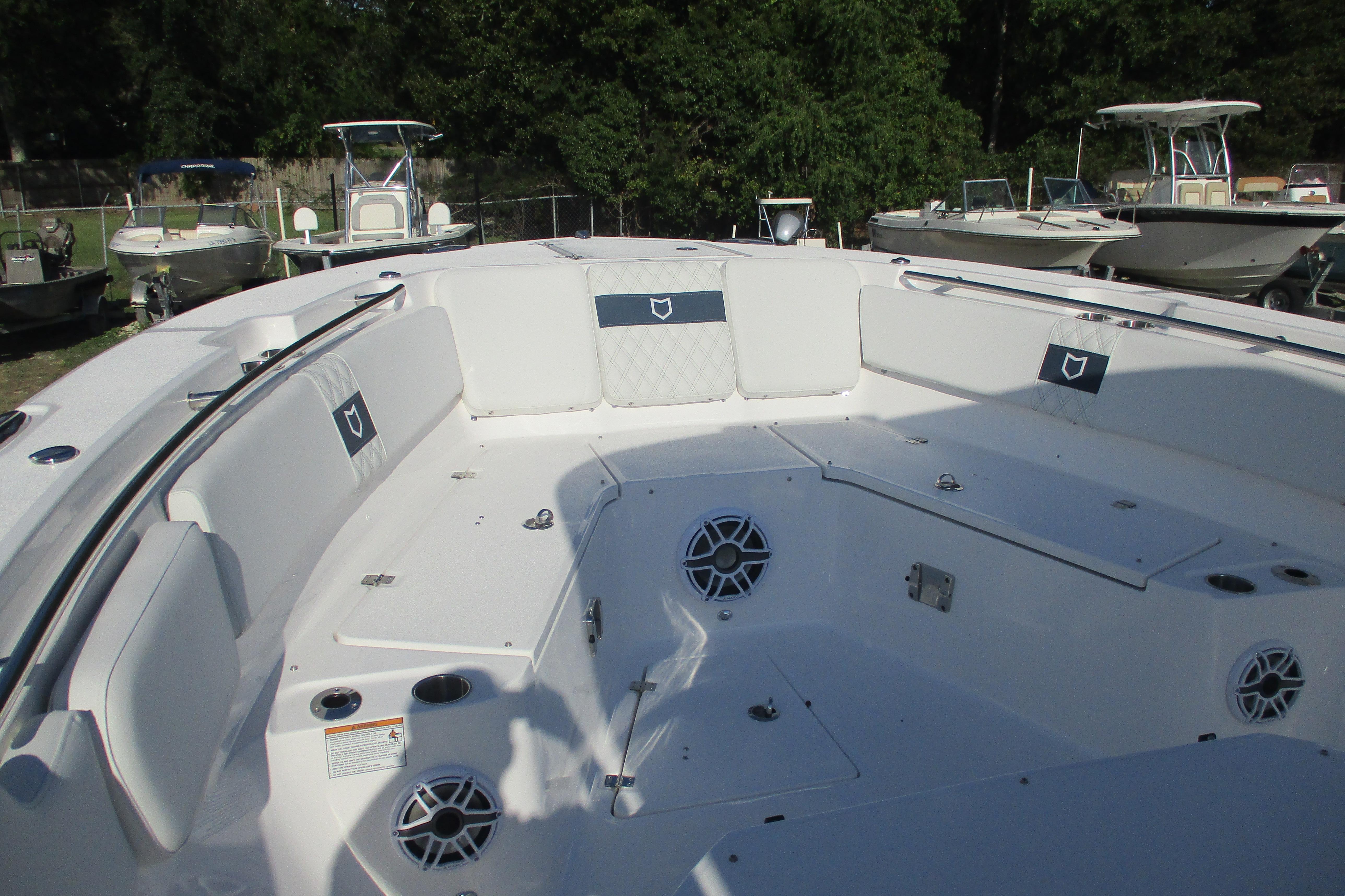 2026 Sea Fox 328 Commander boat interior with seating and speakers.