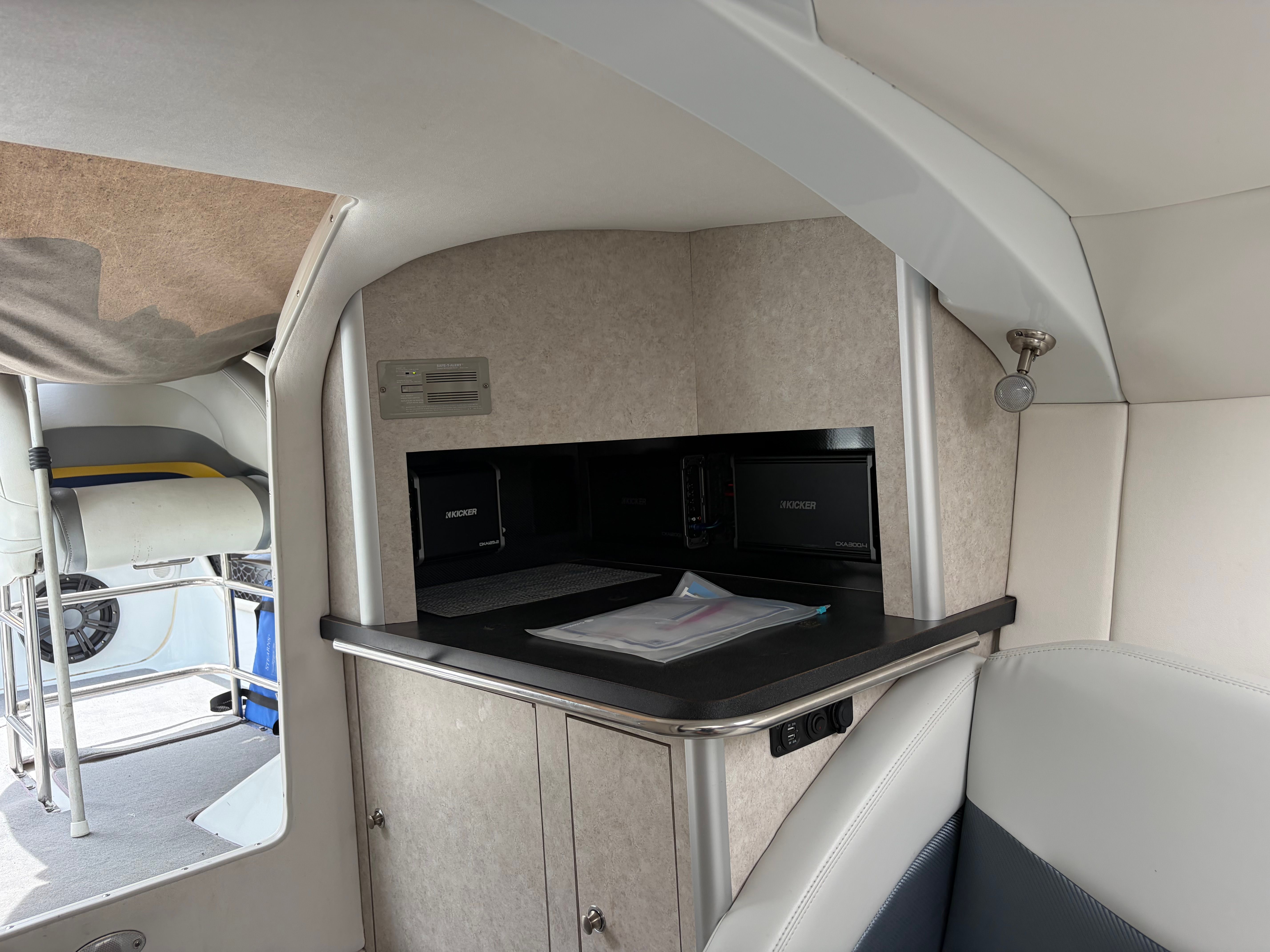 Interior of a 2007 Baja 30 Outlaw boat with seating area.