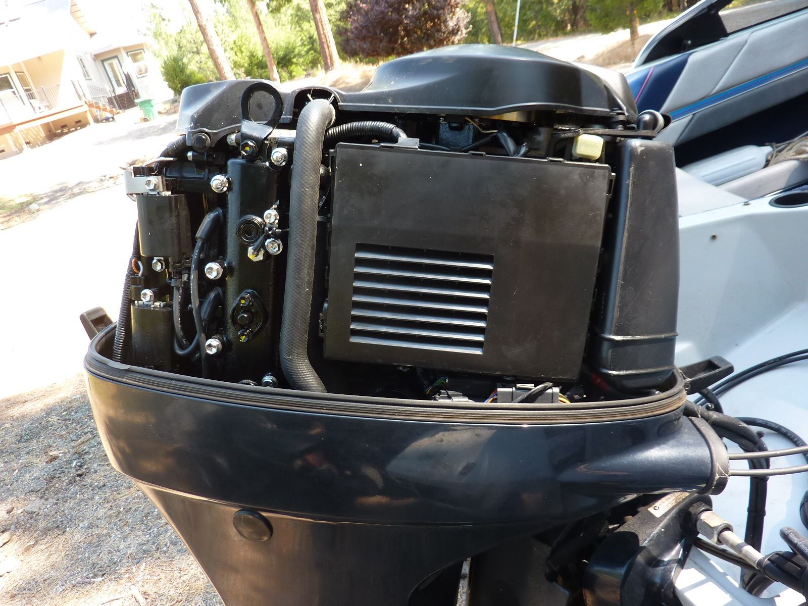 Close-up of an outboard motor on a 1989 Bayliner CAPRI boat.