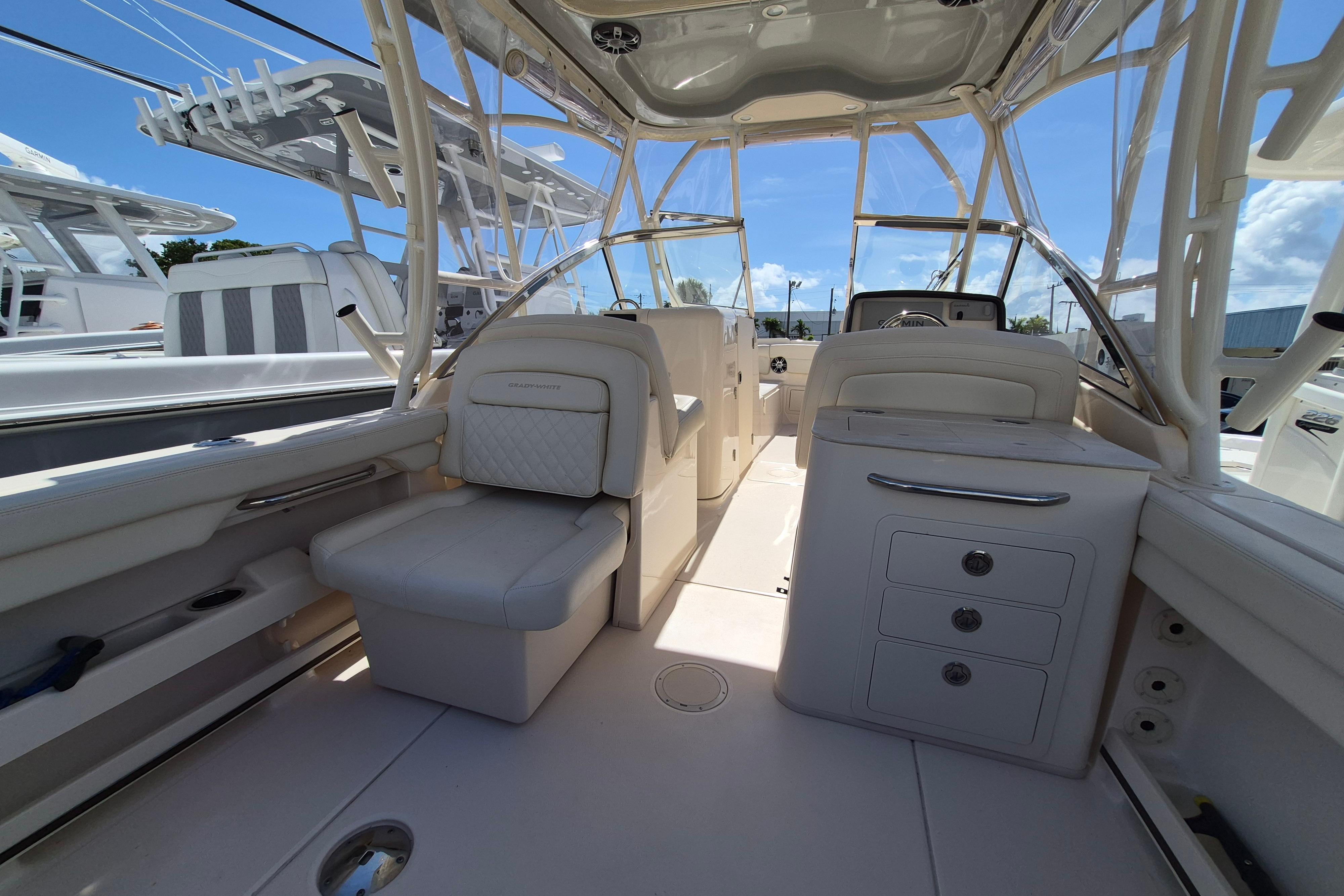 Interior view of 2025 Grady-White Freedom 275 boat, showcasing seating and storage.