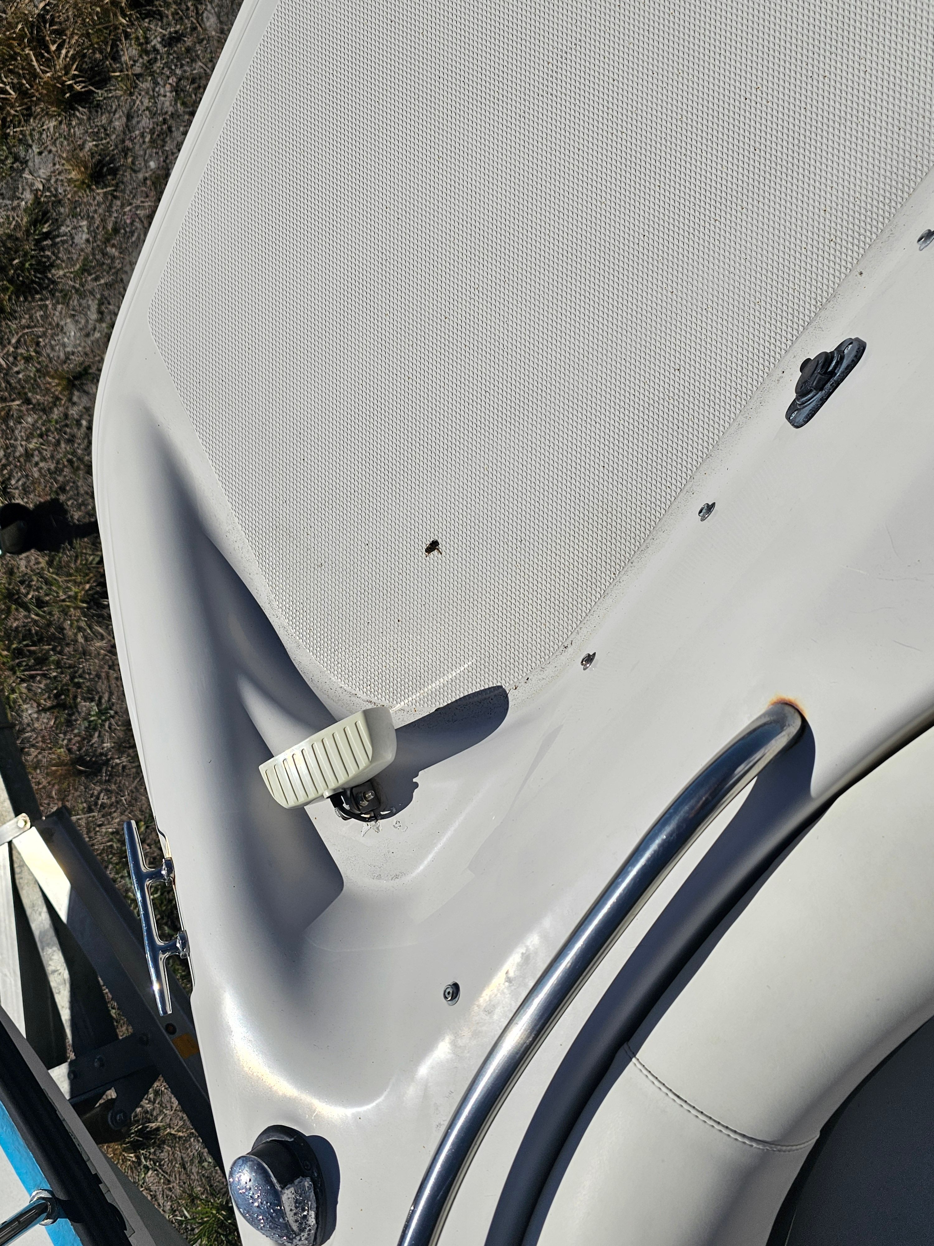 Close-up of a 2002 Godfrey Hurricane Sundeck 187 boat deck.