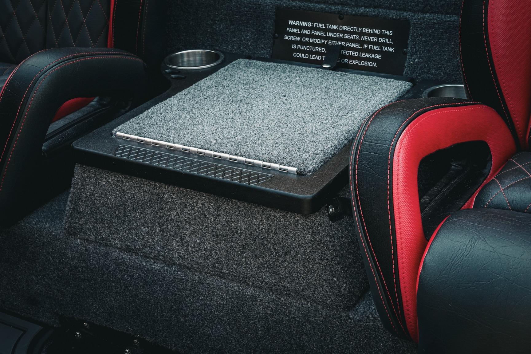 Interior of 2026 Phoenix 721 ZXL with red and black seats, carpeted panel.