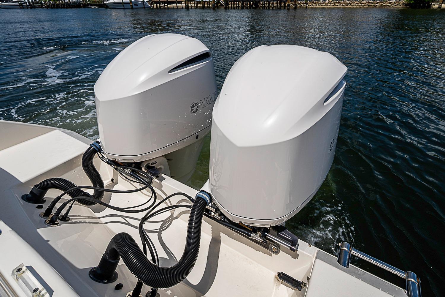 Twin Yamaha outboard engines on a 2019 Cobia 320 Center Console boat.