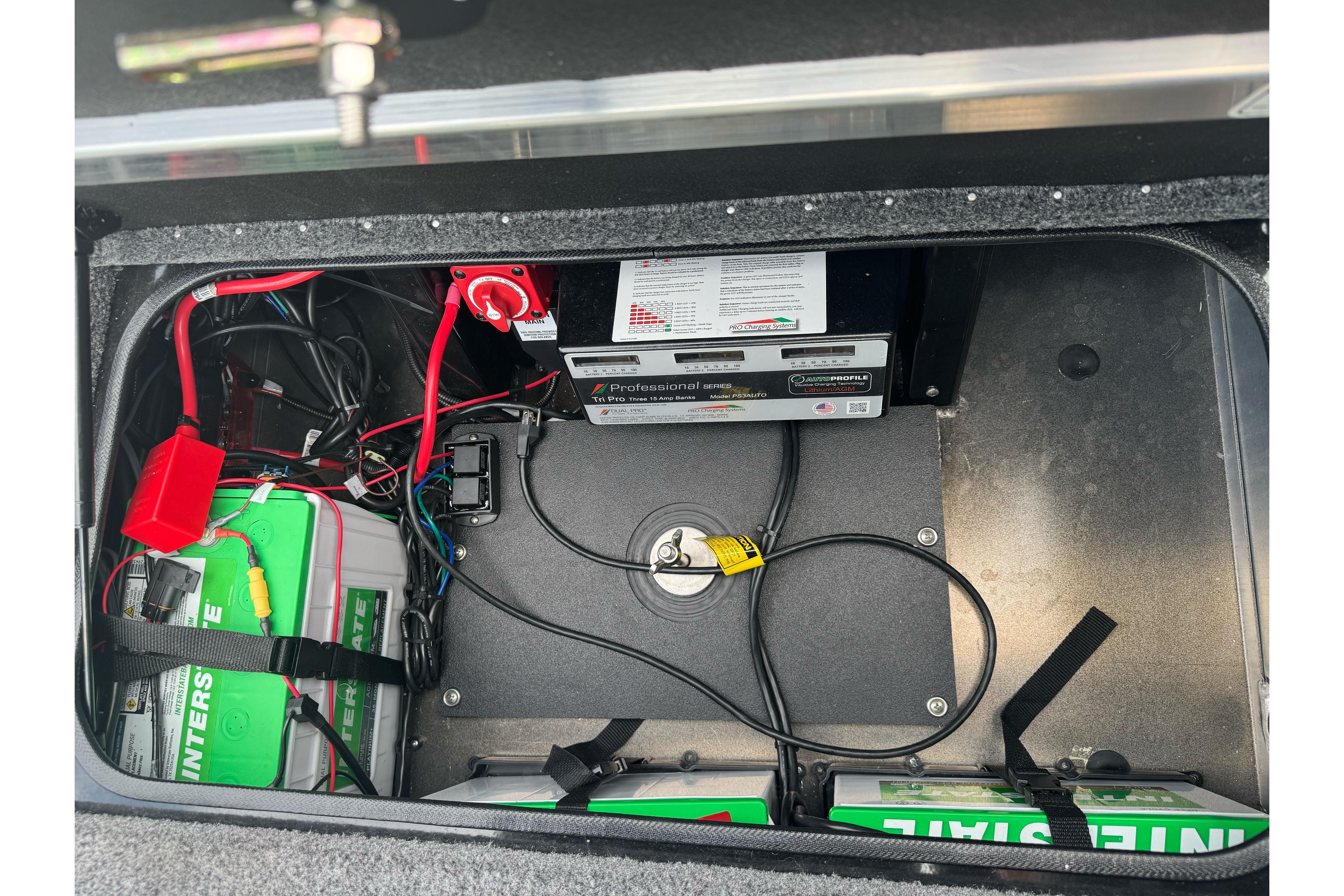 Battery compartment of 2026 Ranger ALPHA 208 with wiring and power management system.