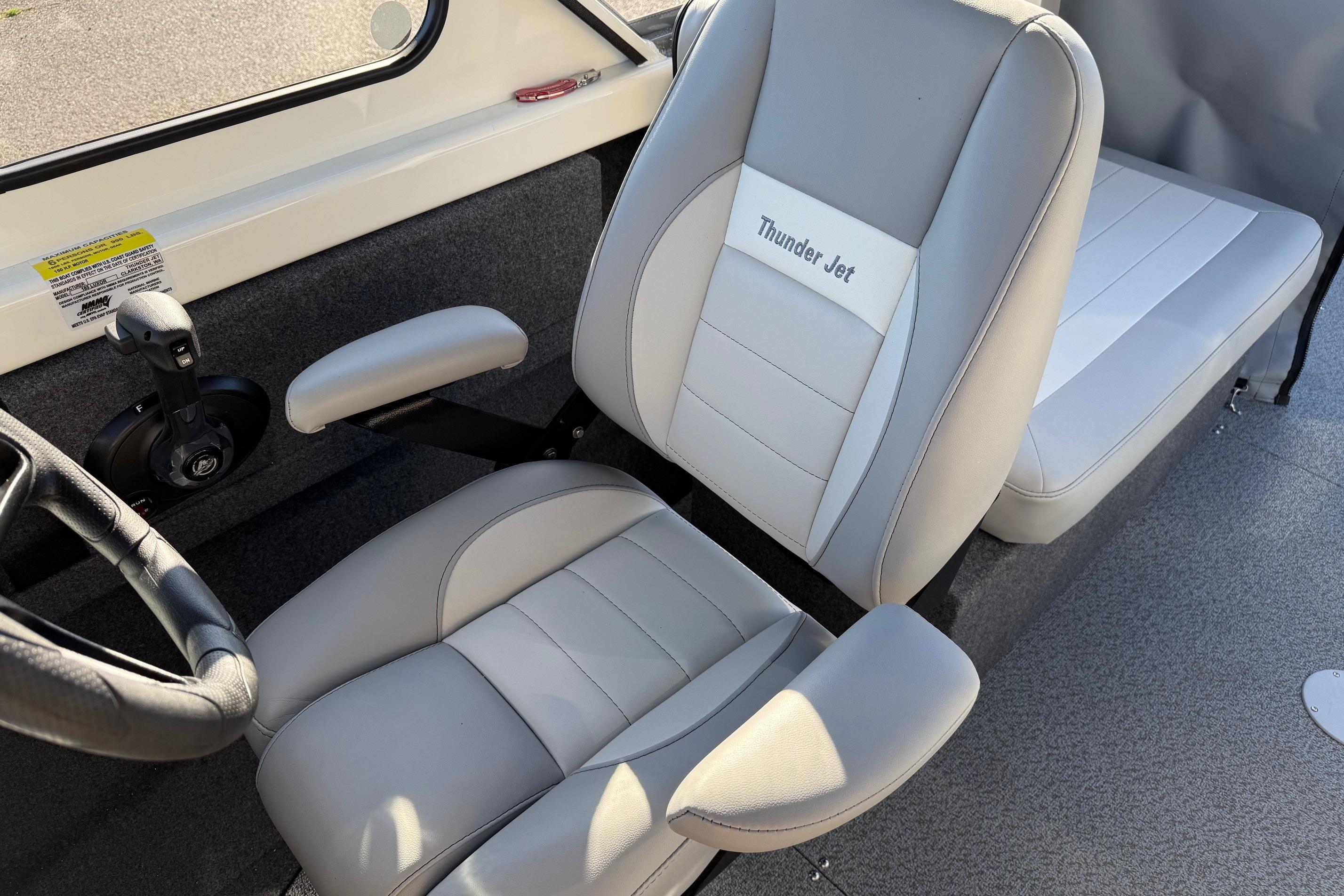 2026 Thunder Jet 185 Luxor boat interior with gray seating and steering wheel.