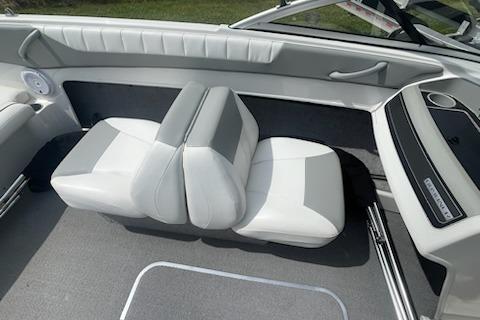 2013 Bayliner 190 Bowrider interior with white and gray seating, modern design.