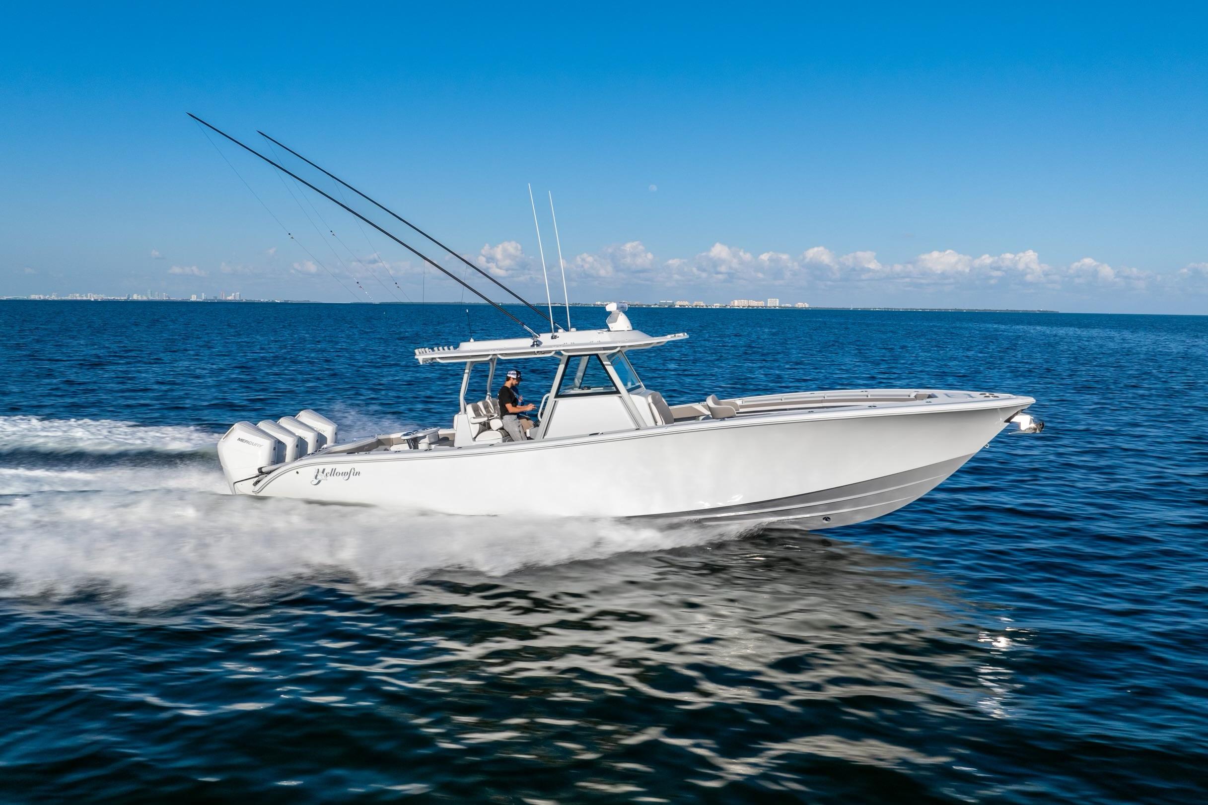 2024 Yellowfin 39 boat cruising on open water under clear blue sky.