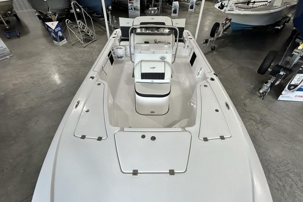 2026 Tidewater 1910 Bay Max boat interior, showcasing seating and storage compartments.