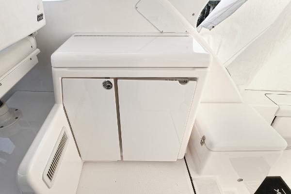 2008 Tiara Yachts 4200 Open interior, featuring sleek white cabinetry and seating.