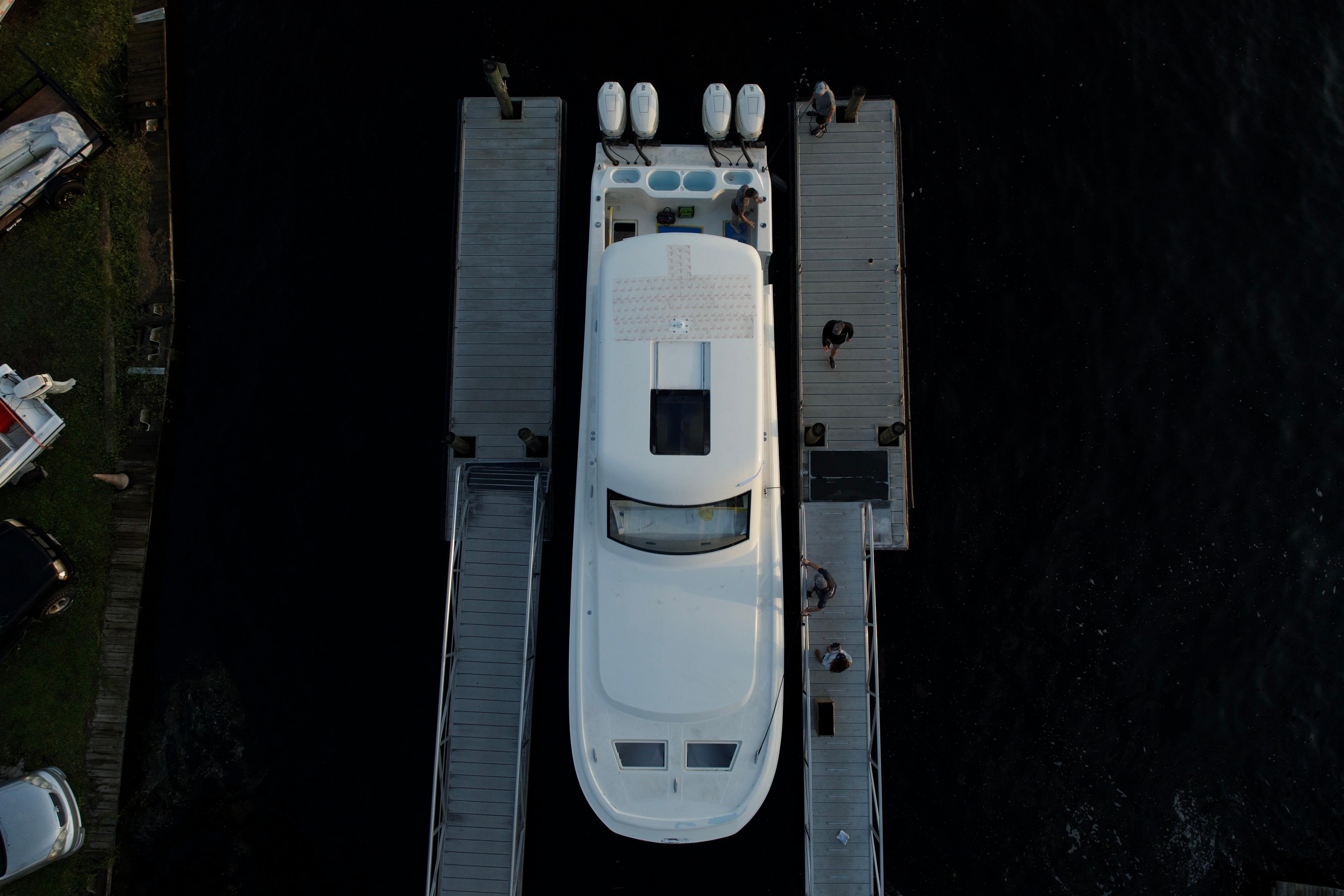 Aerial view of 2026 Front Runner 43' HTX yacht docked at marina.