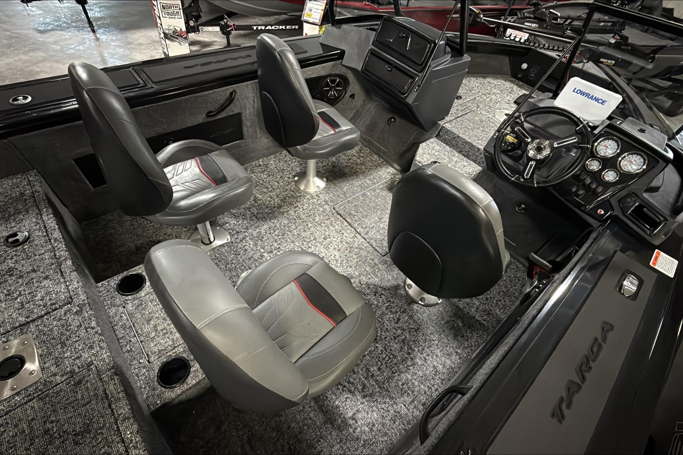 2026 Tracker Targa V-18 WT boat interior with four seats and modern dashboard.